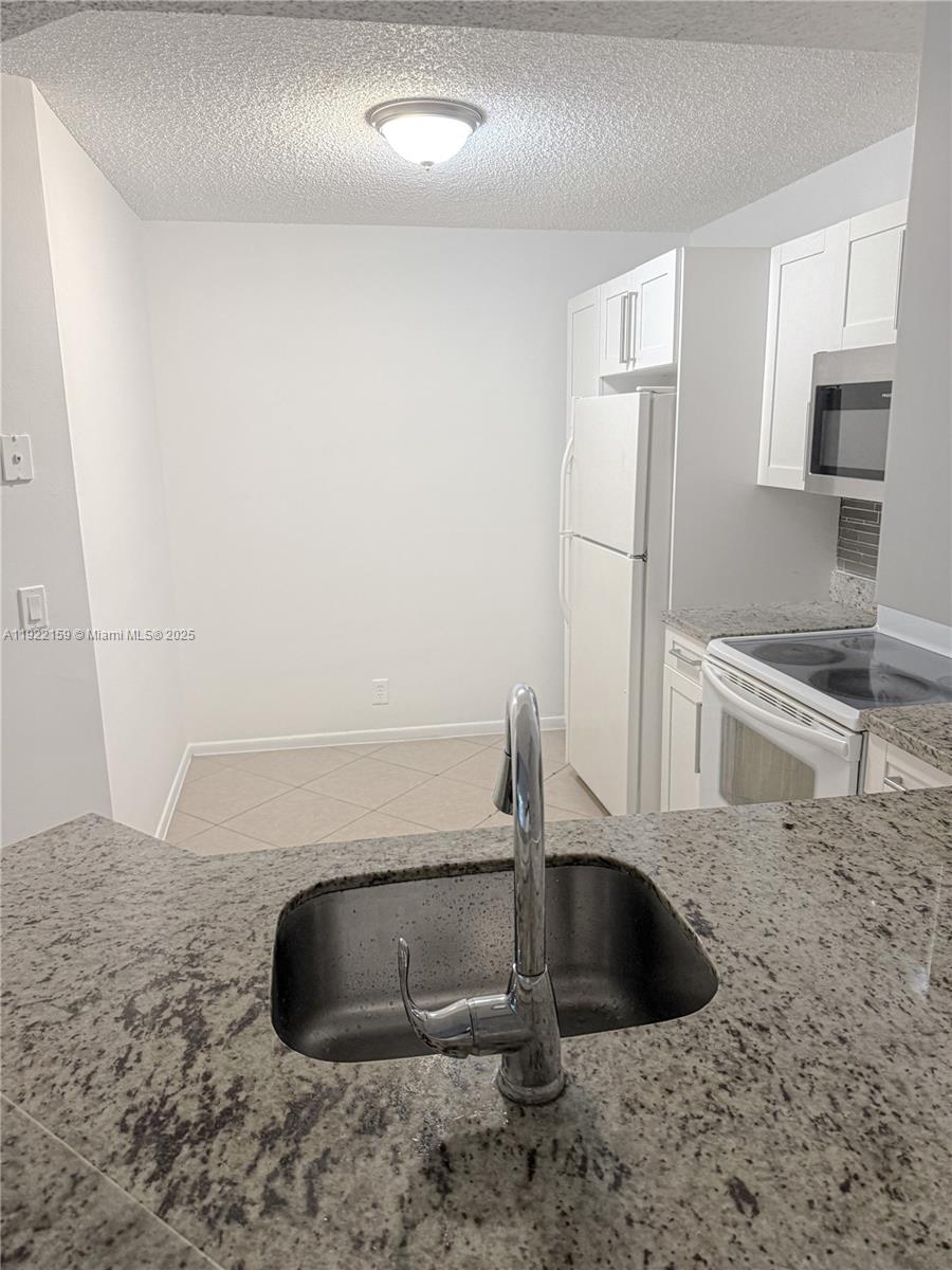 8851 Wiles Rd # 204