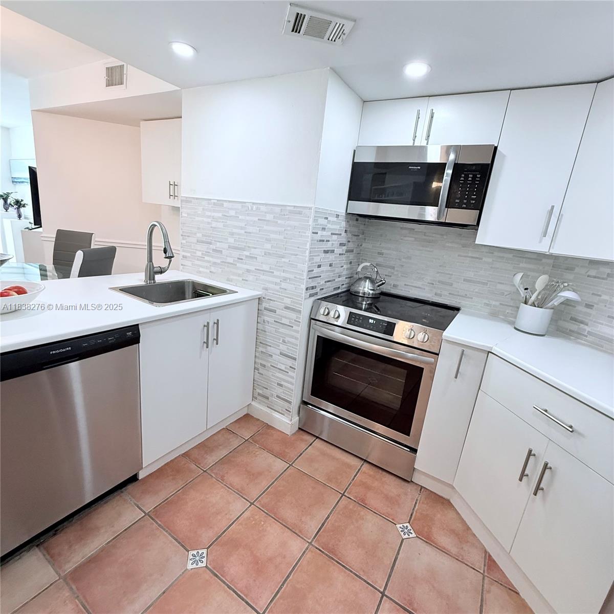 5880 Collins Ave # 303