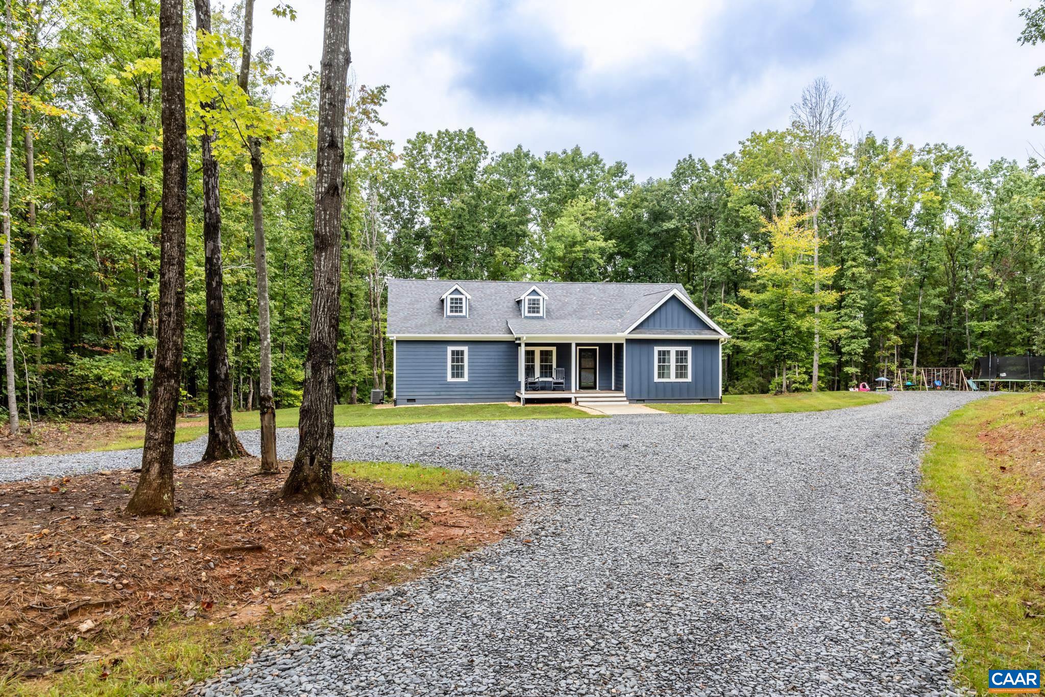 1387 SPREADING OAK RD