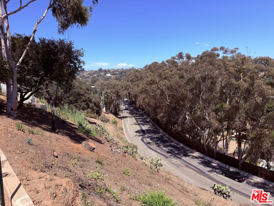 Coveted Chautauqua Rim Lot Above Sunset Blvd | 18,000sqft