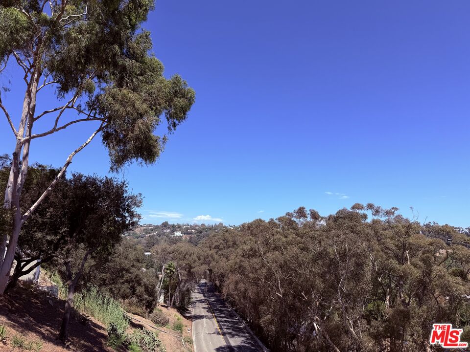 Coveted Chautauqua Rim Lot Above Sunset Blvd | 18,000sqft