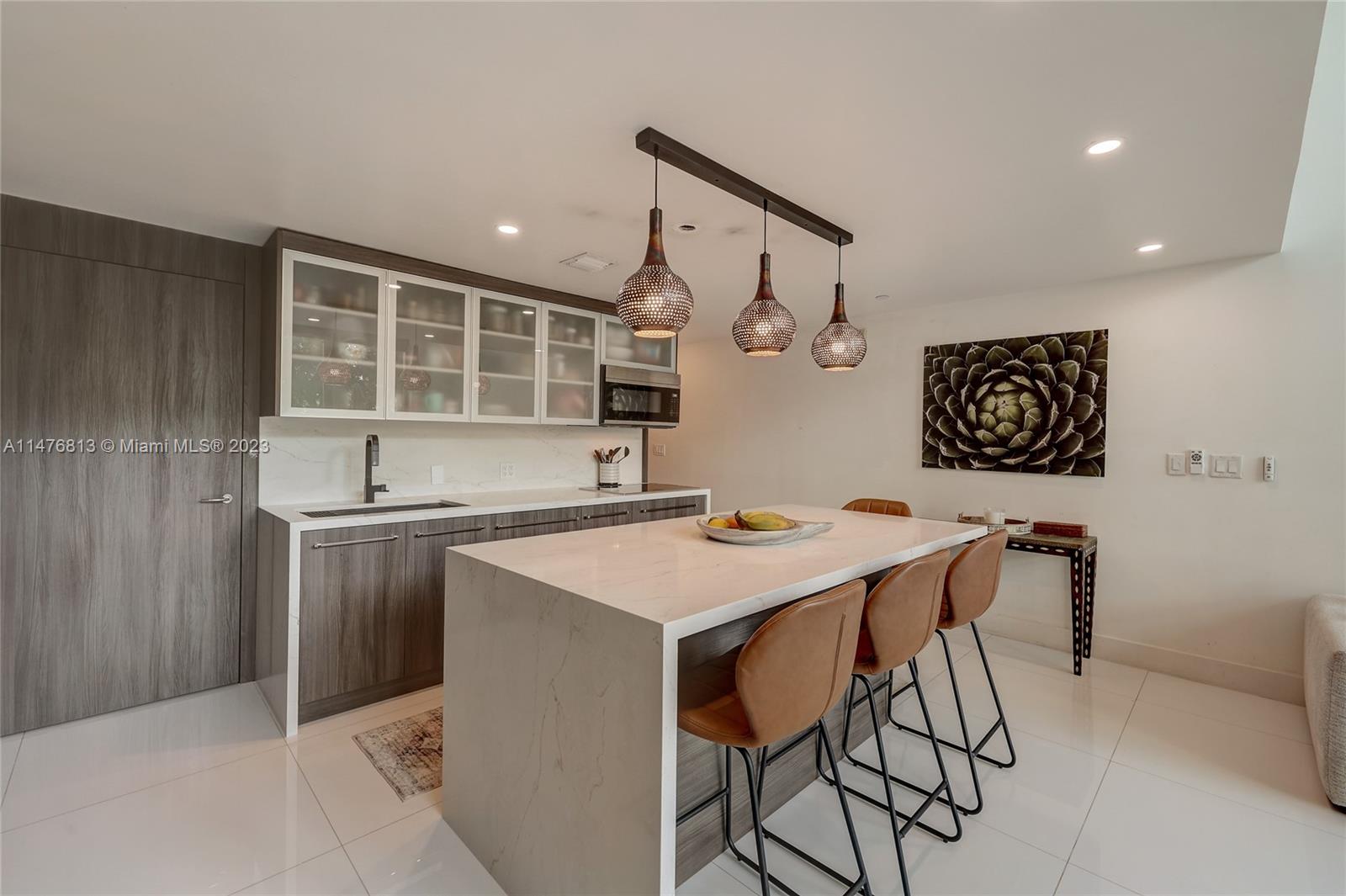 6000 Collins Ave # 104