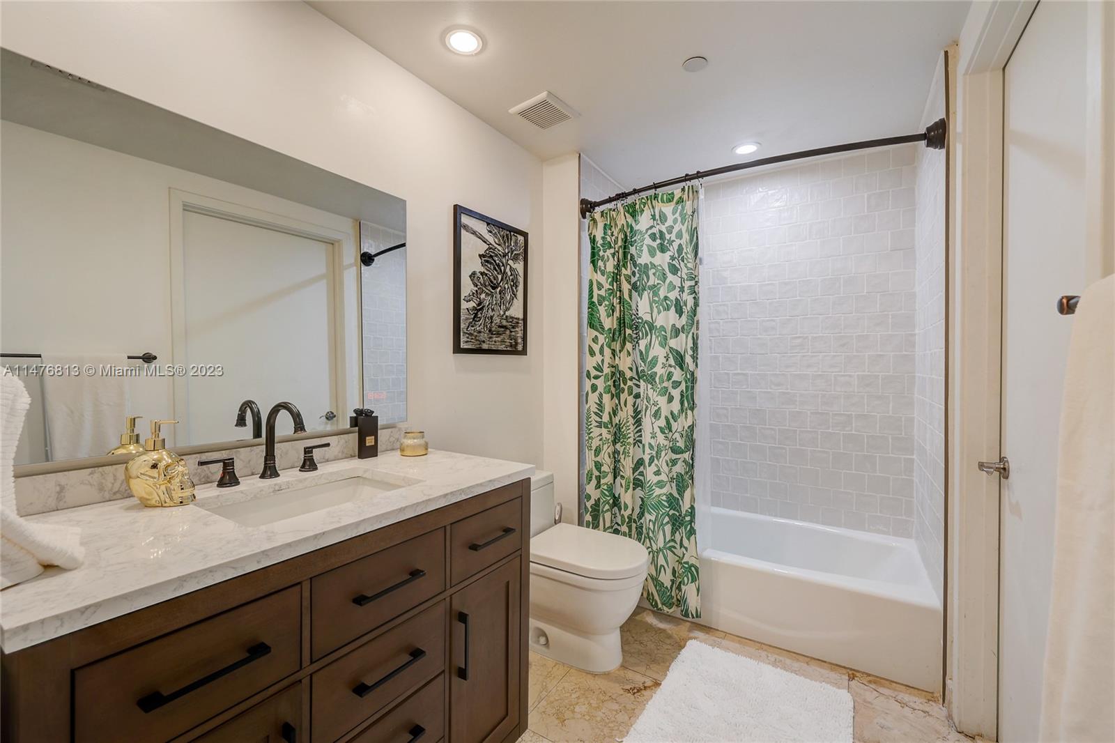 6000 Collins Ave # 104