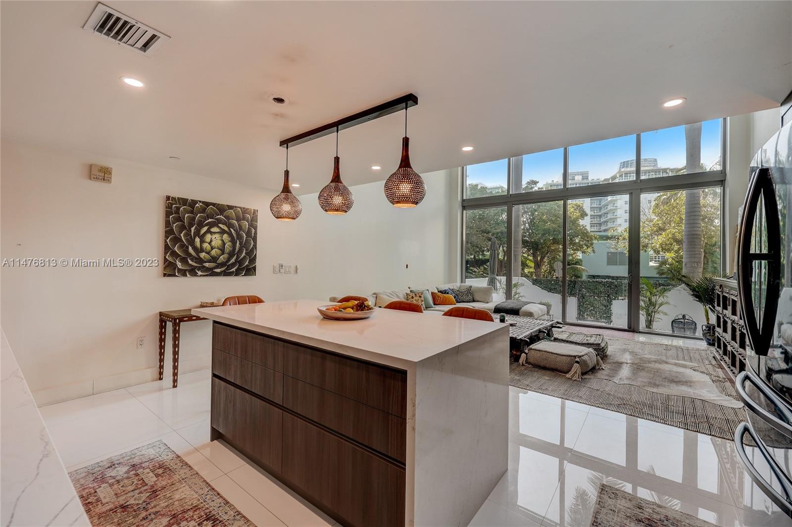 6000 Collins Ave # 104