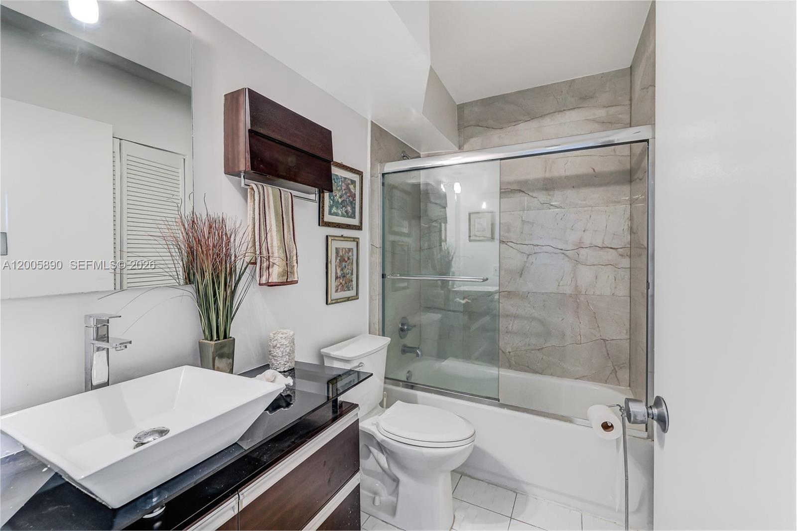 5900 Collins Ave # 402