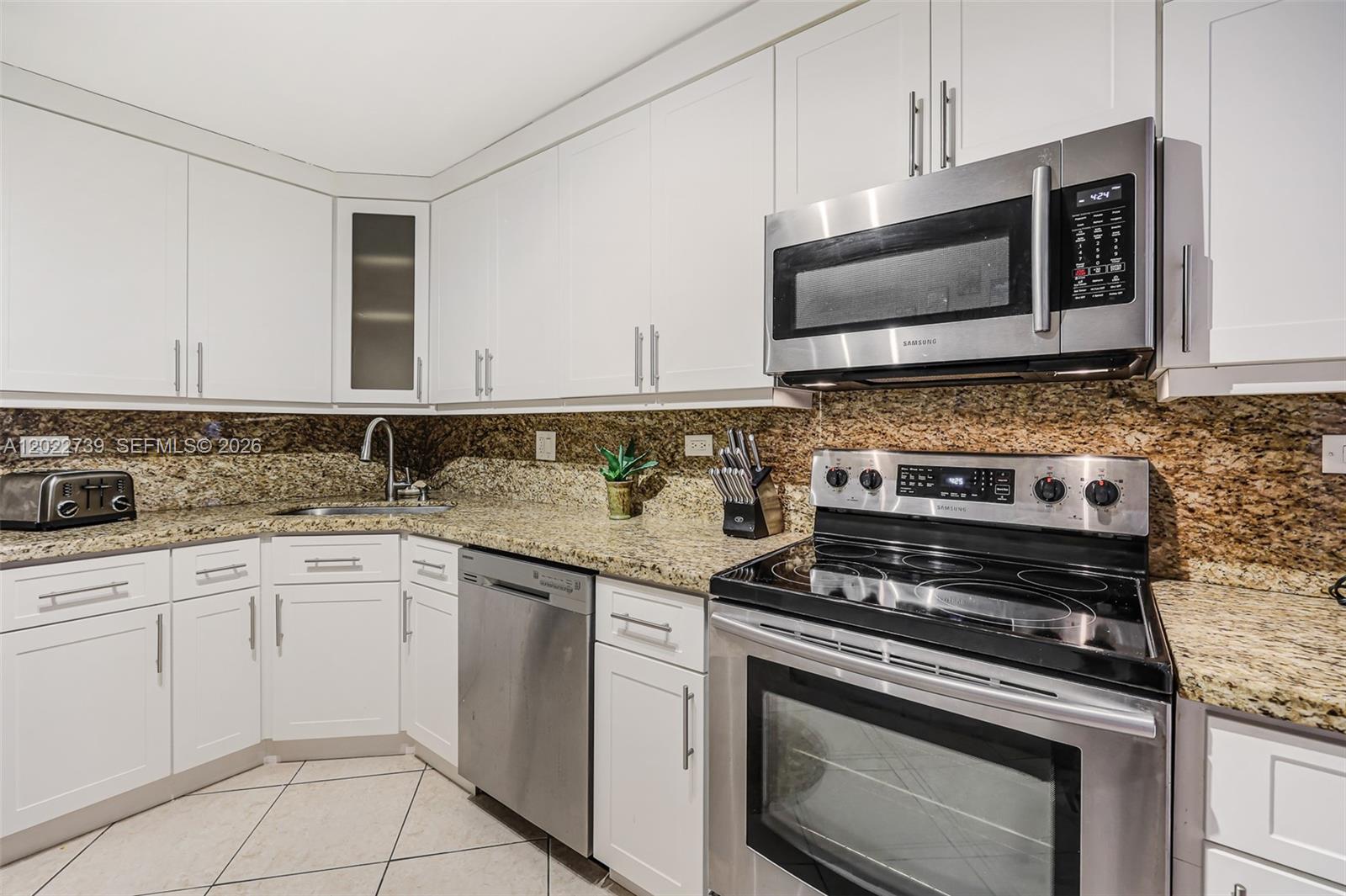 6039 Collins Ave # 936