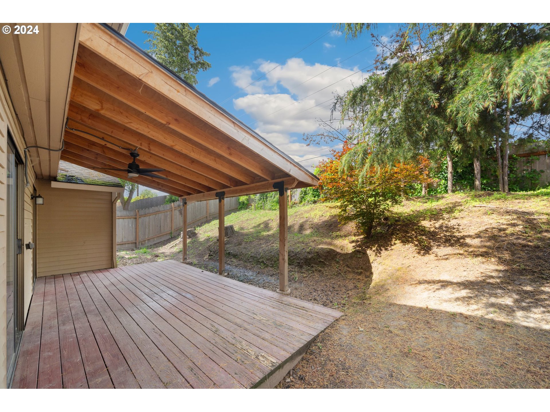 5538 NW BURNING TREE CT