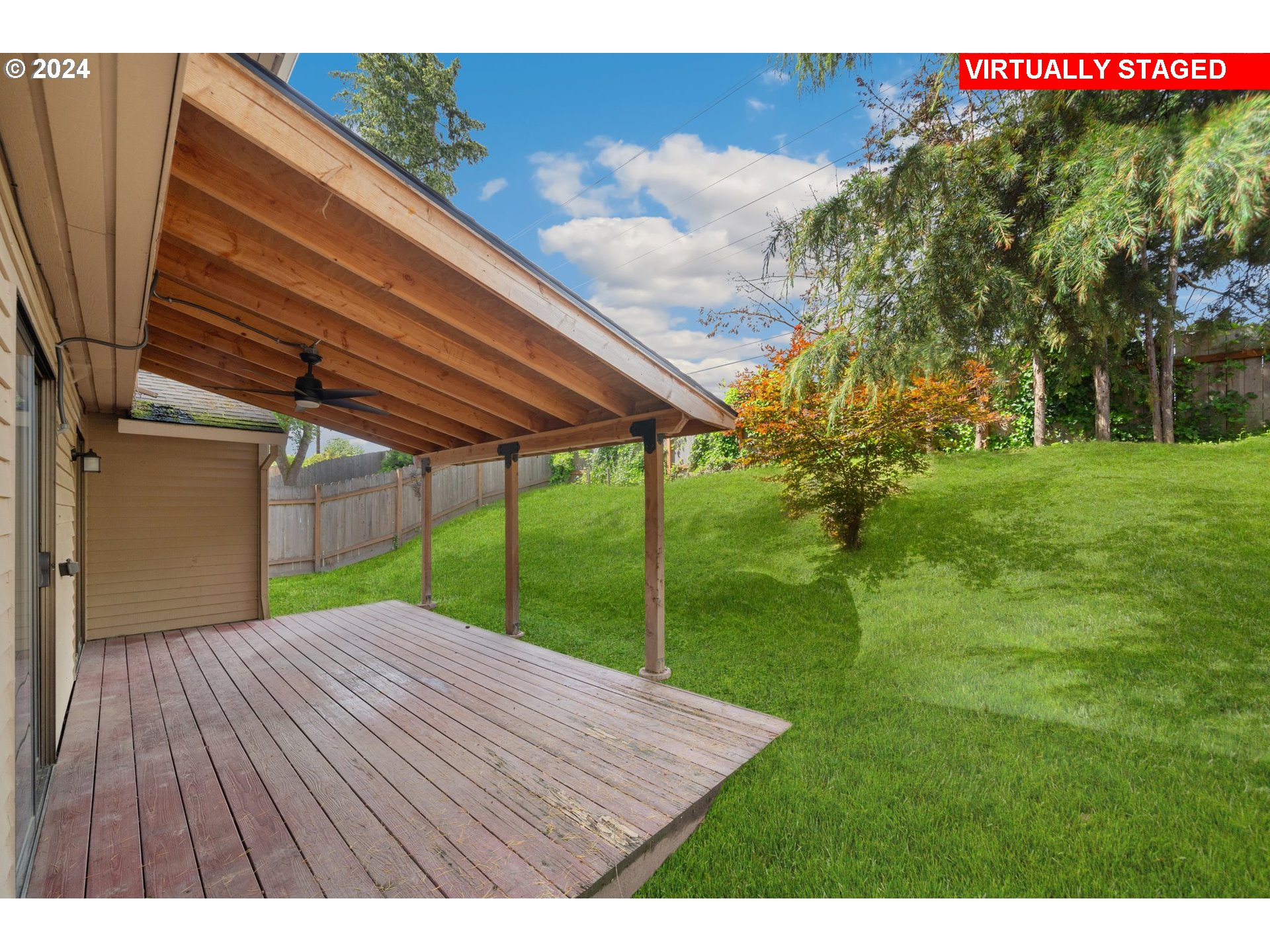 5538 NW BURNING TREE CT