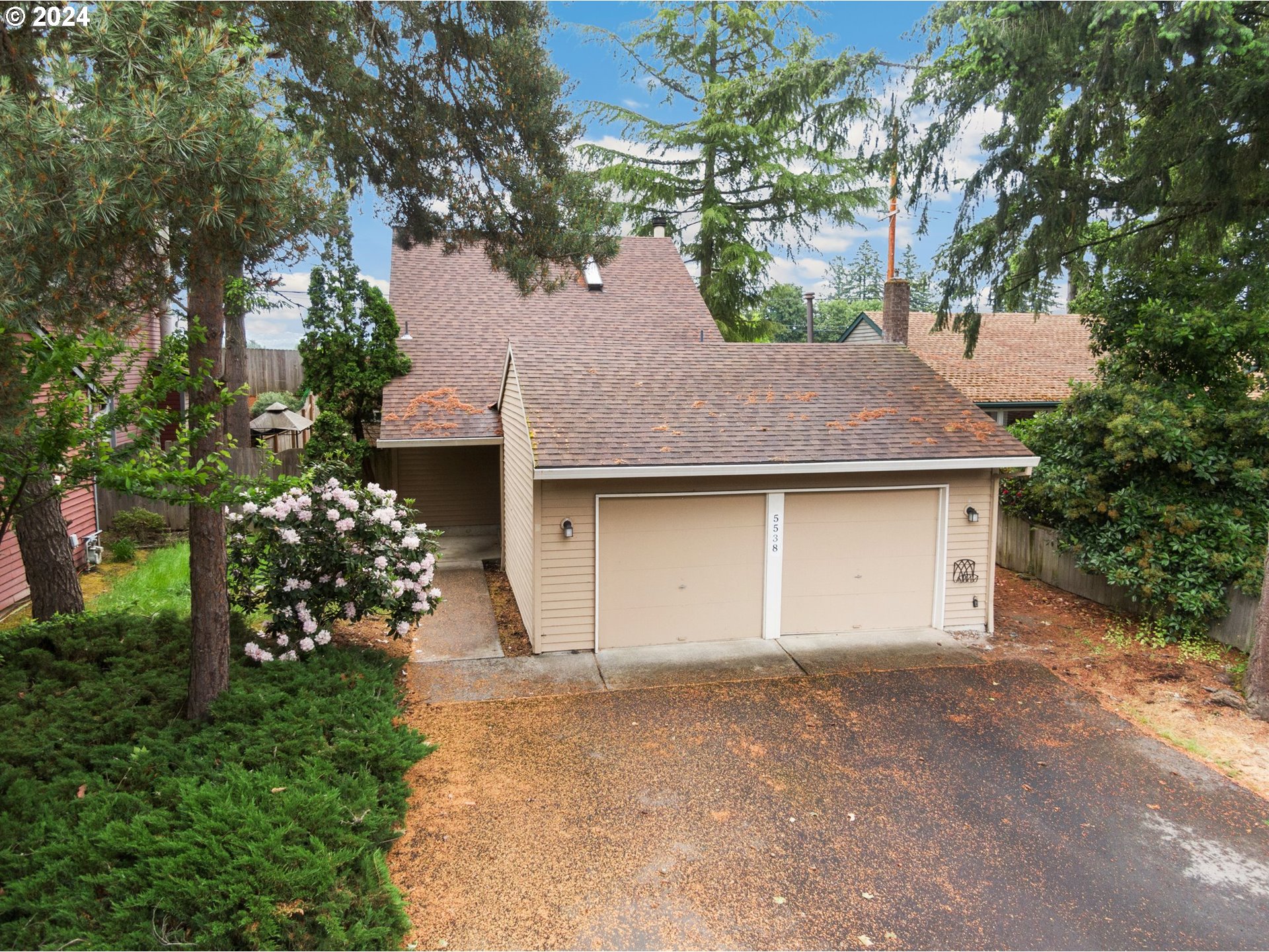 5538 NW BURNING TREE CT