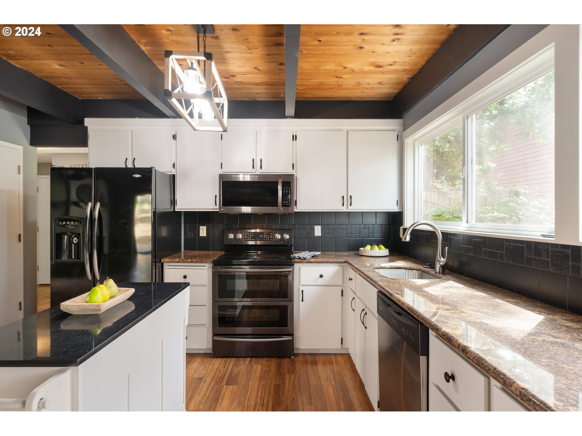 5538 NW BURNING TREE CT