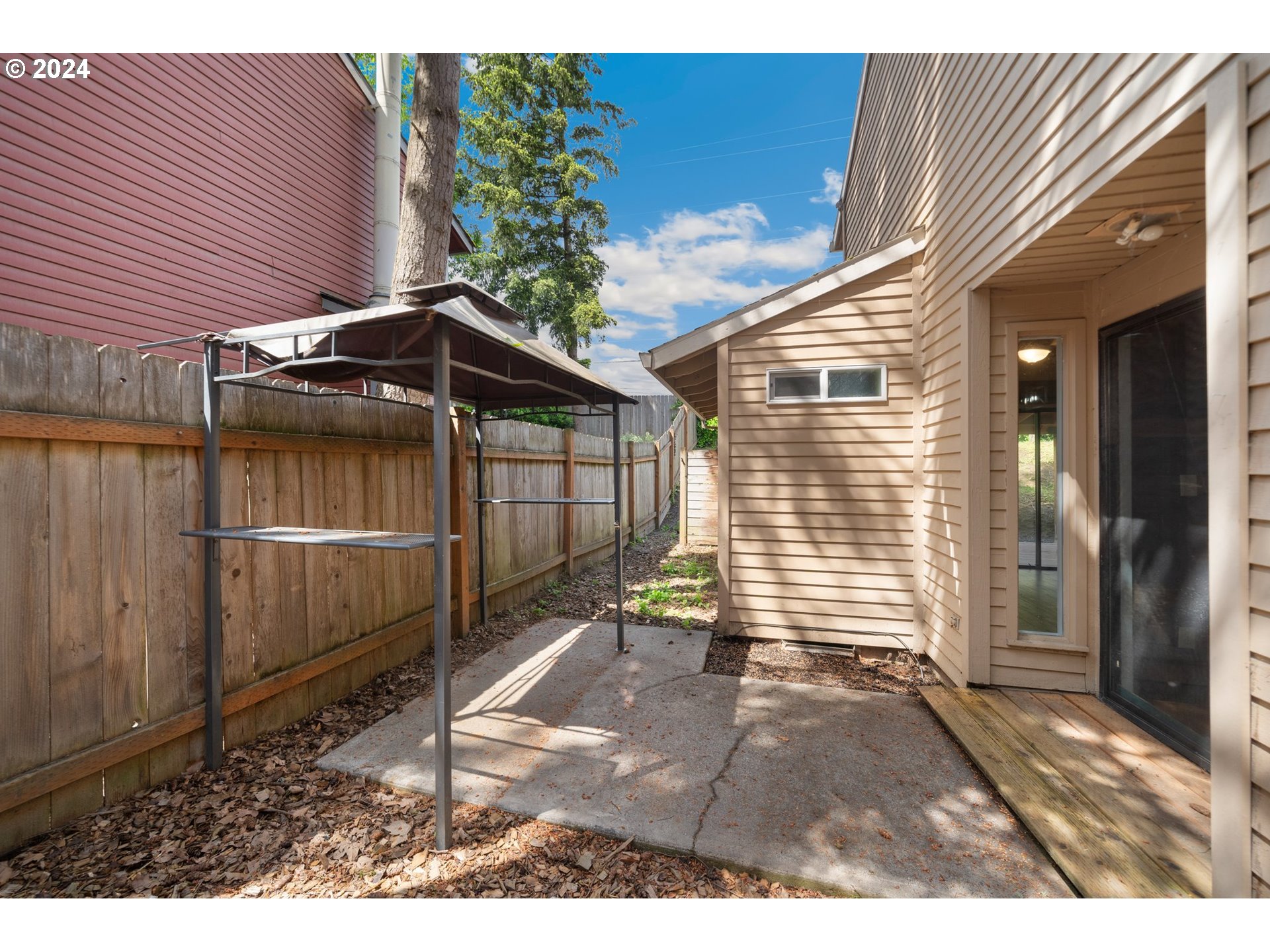 5538 NW BURNING TREE CT