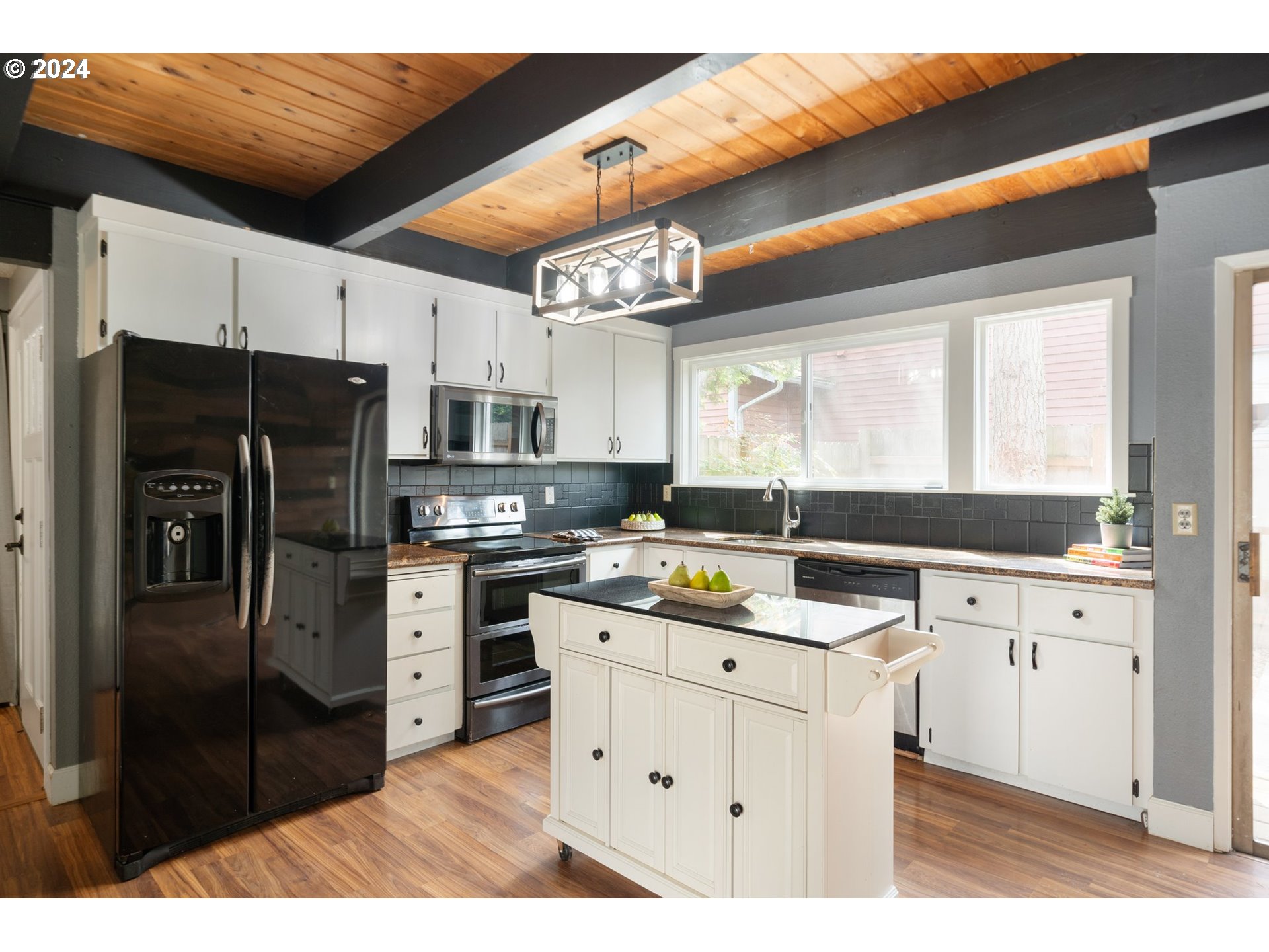 5538 NW BURNING TREE CT