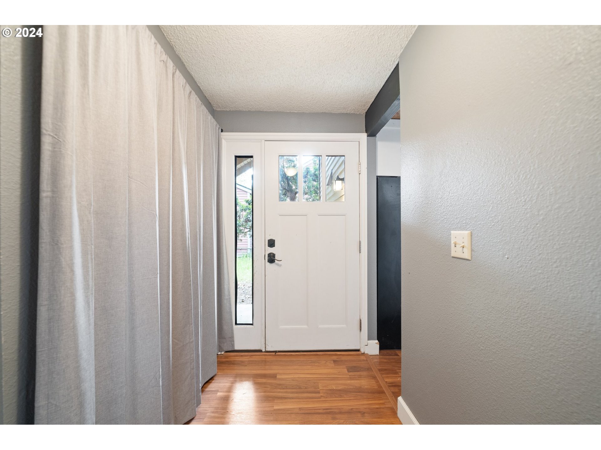 5538 NW BURNING TREE CT