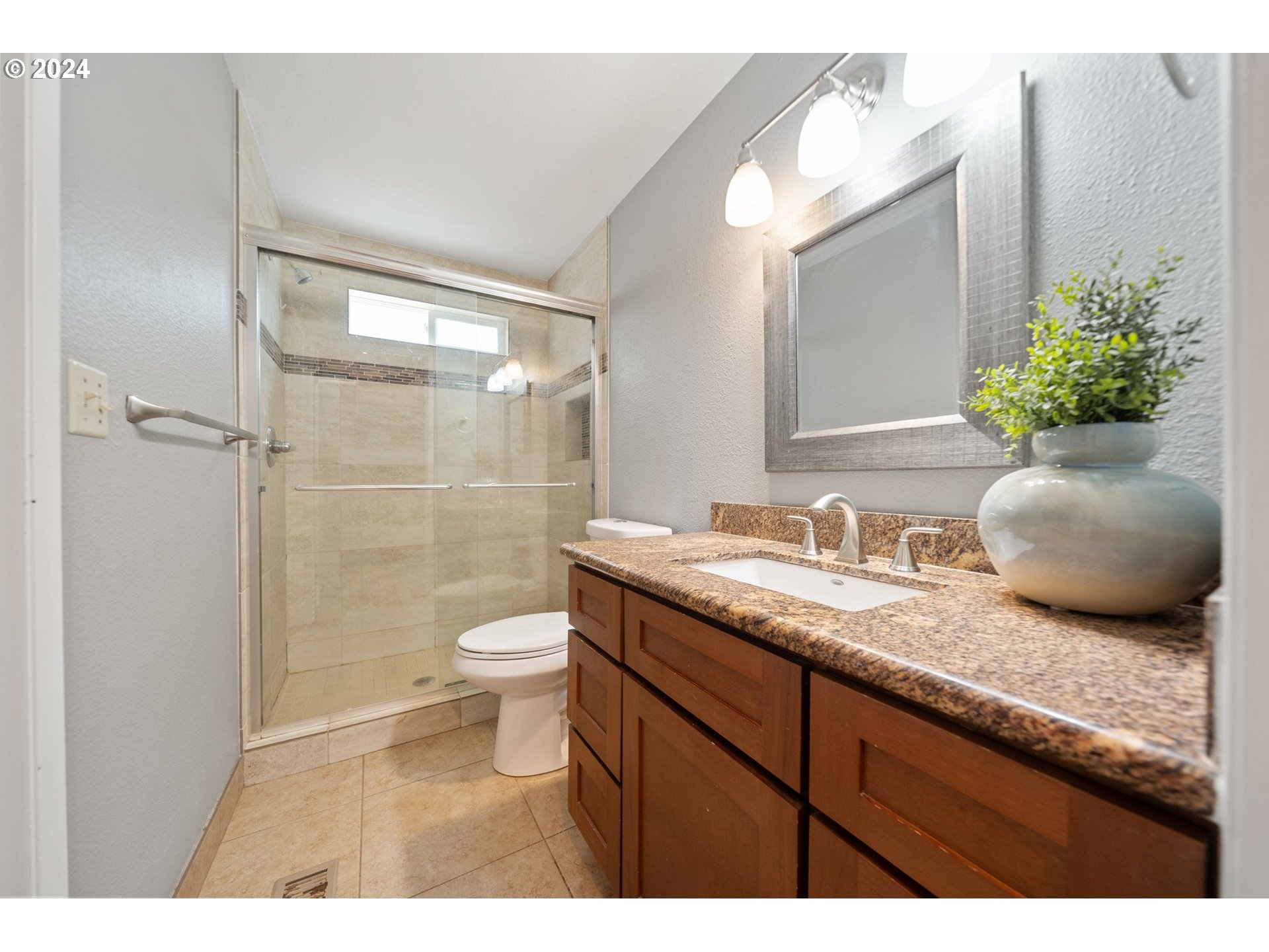 5538 NW BURNING TREE CT