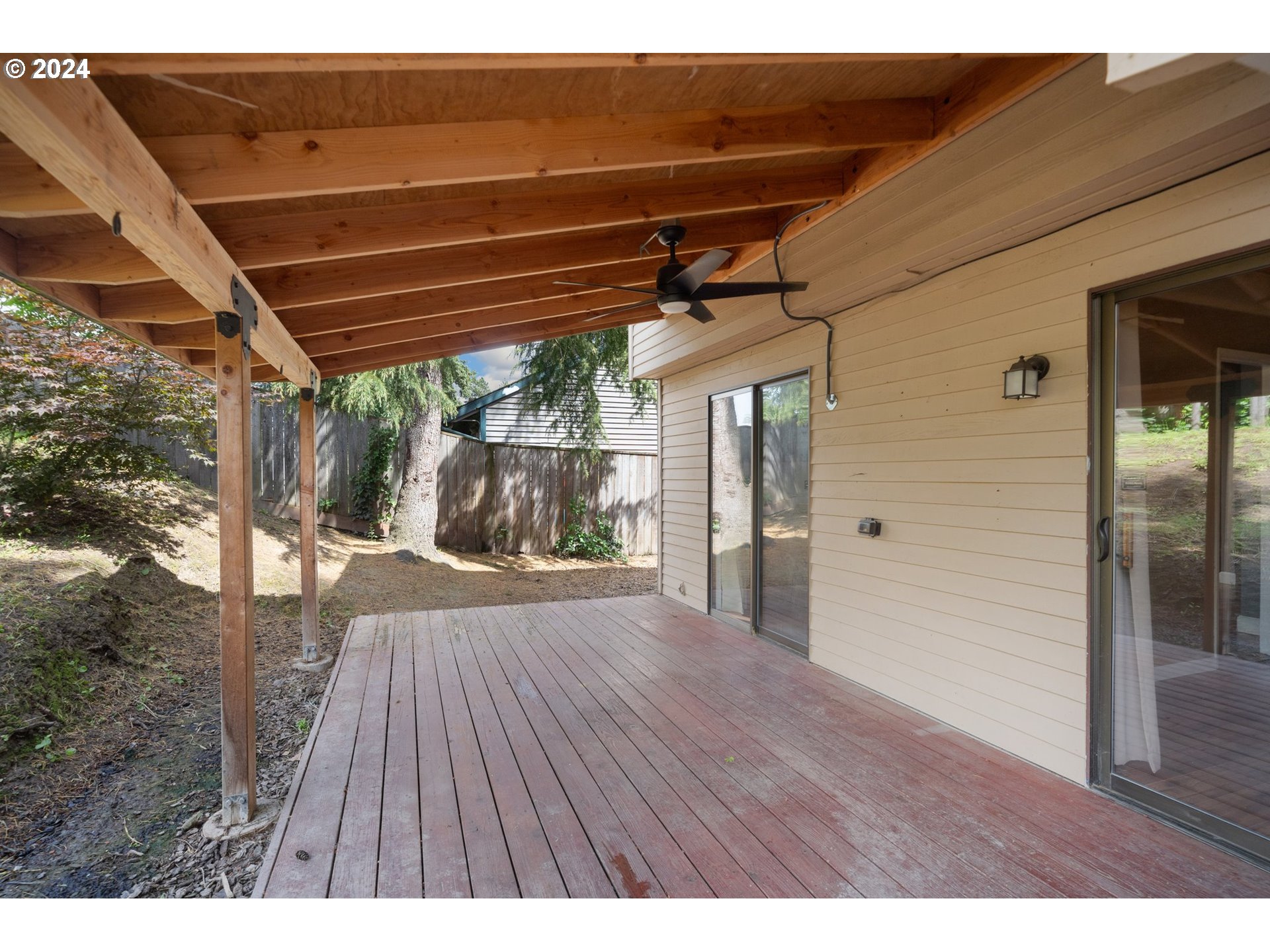 5538 NW BURNING TREE CT