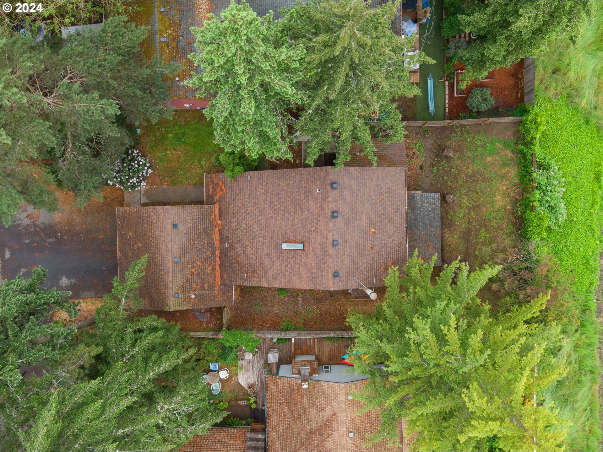 5538 NW BURNING TREE CT