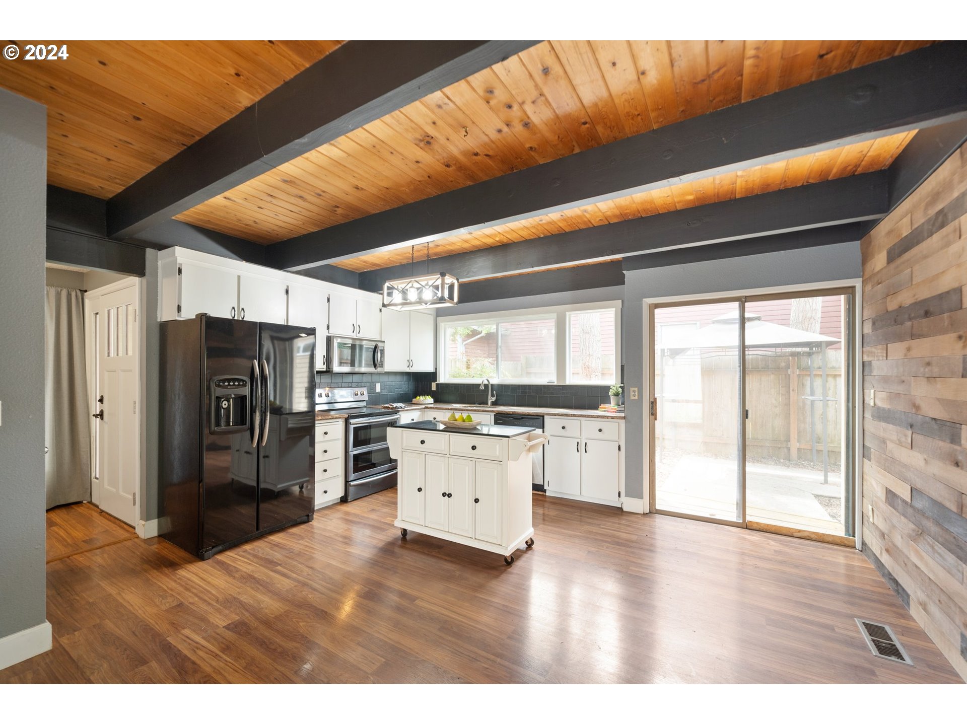 5538 NW BURNING TREE CT