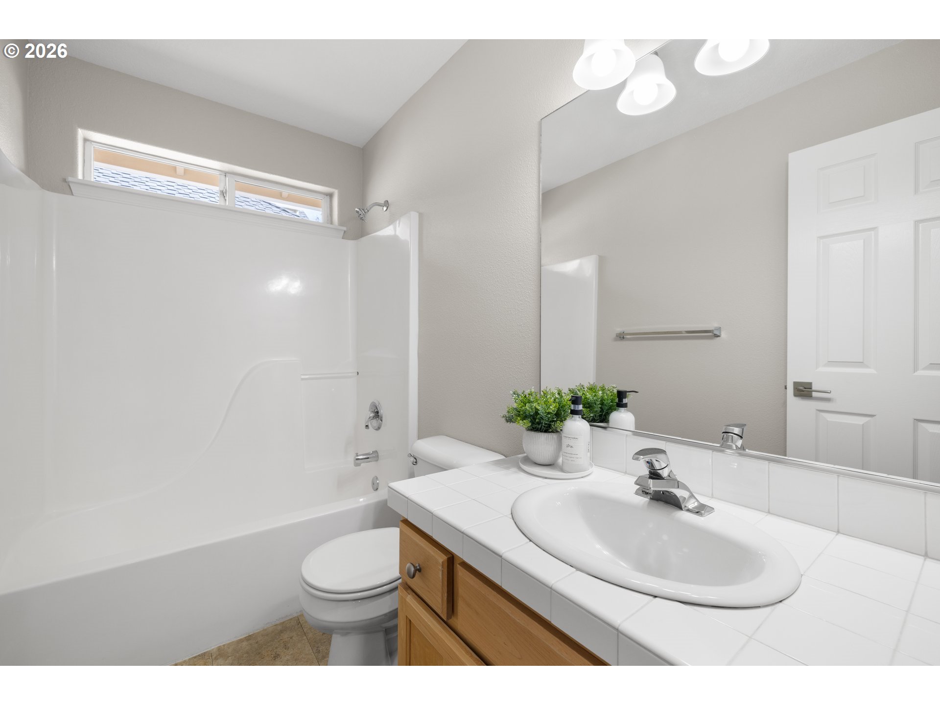 1295 NE SETTING SUN DR