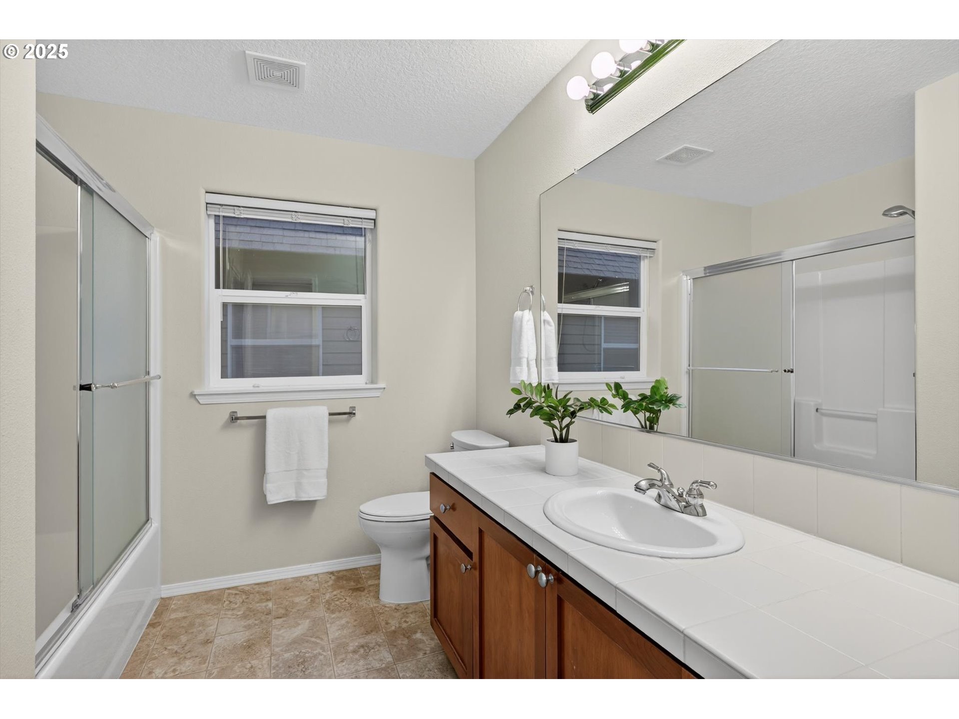 5658 NE ORENCO GARDENS DR