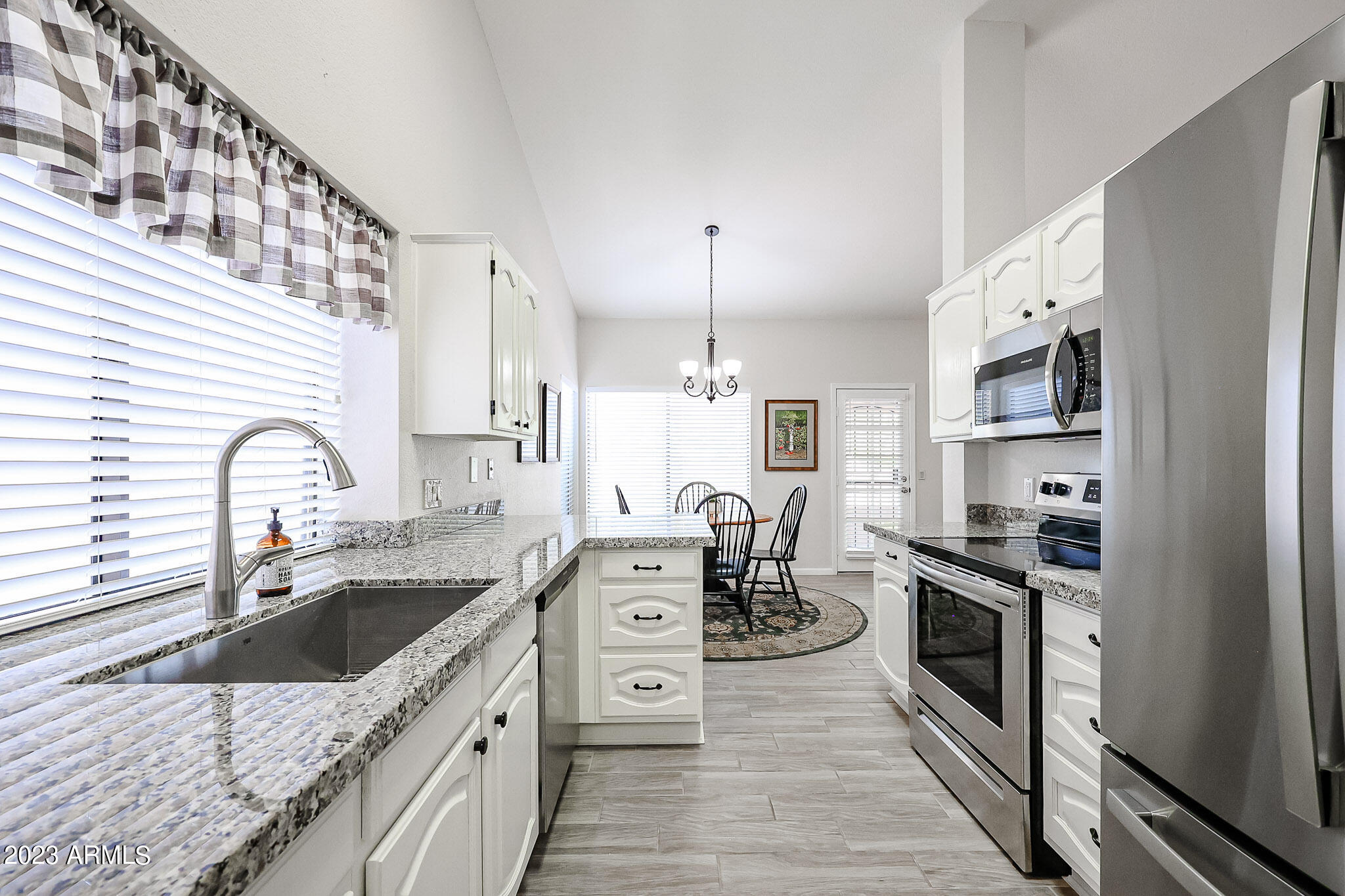 9802 W MENADOTA Drive