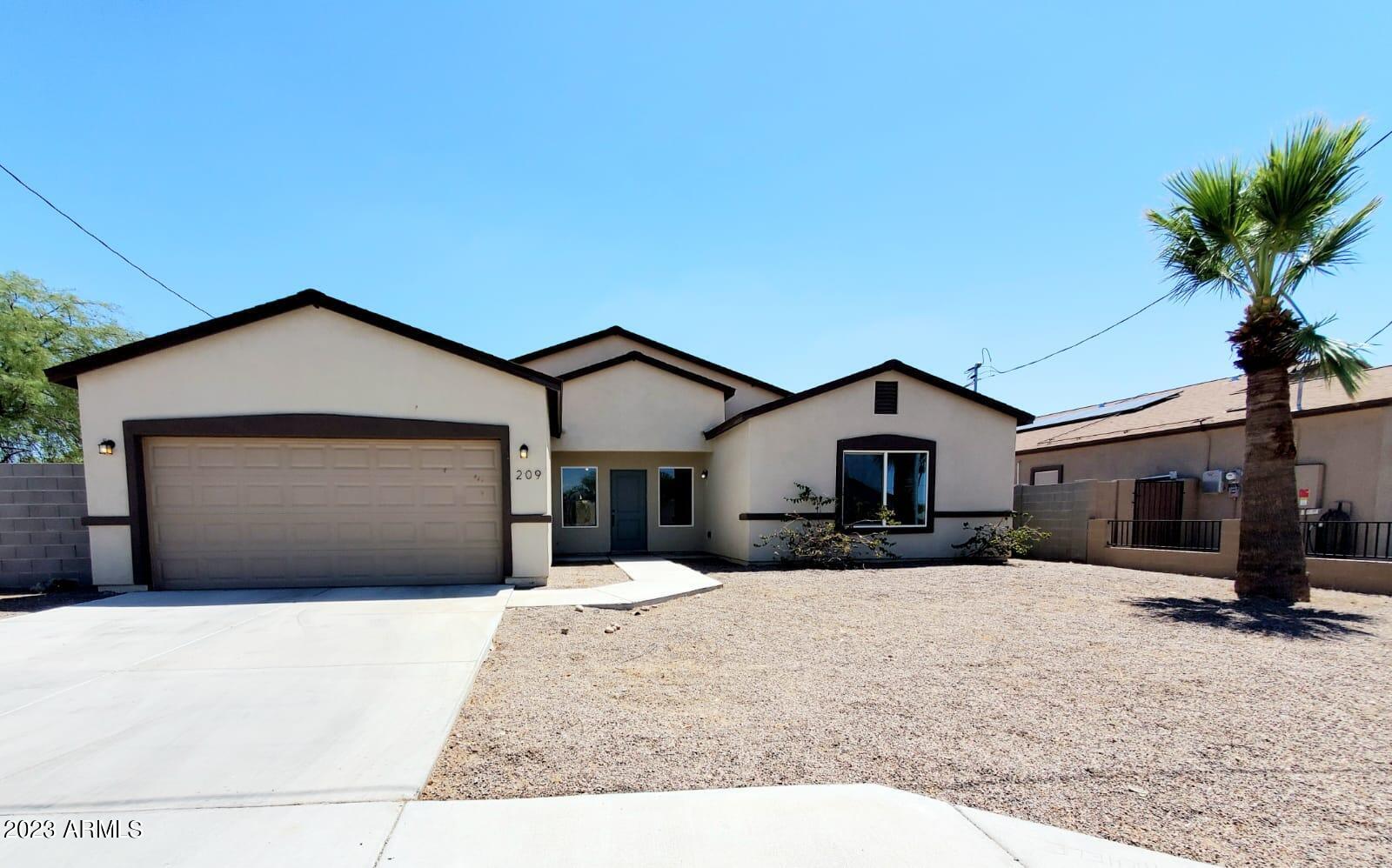 209 E HARRISON Drive