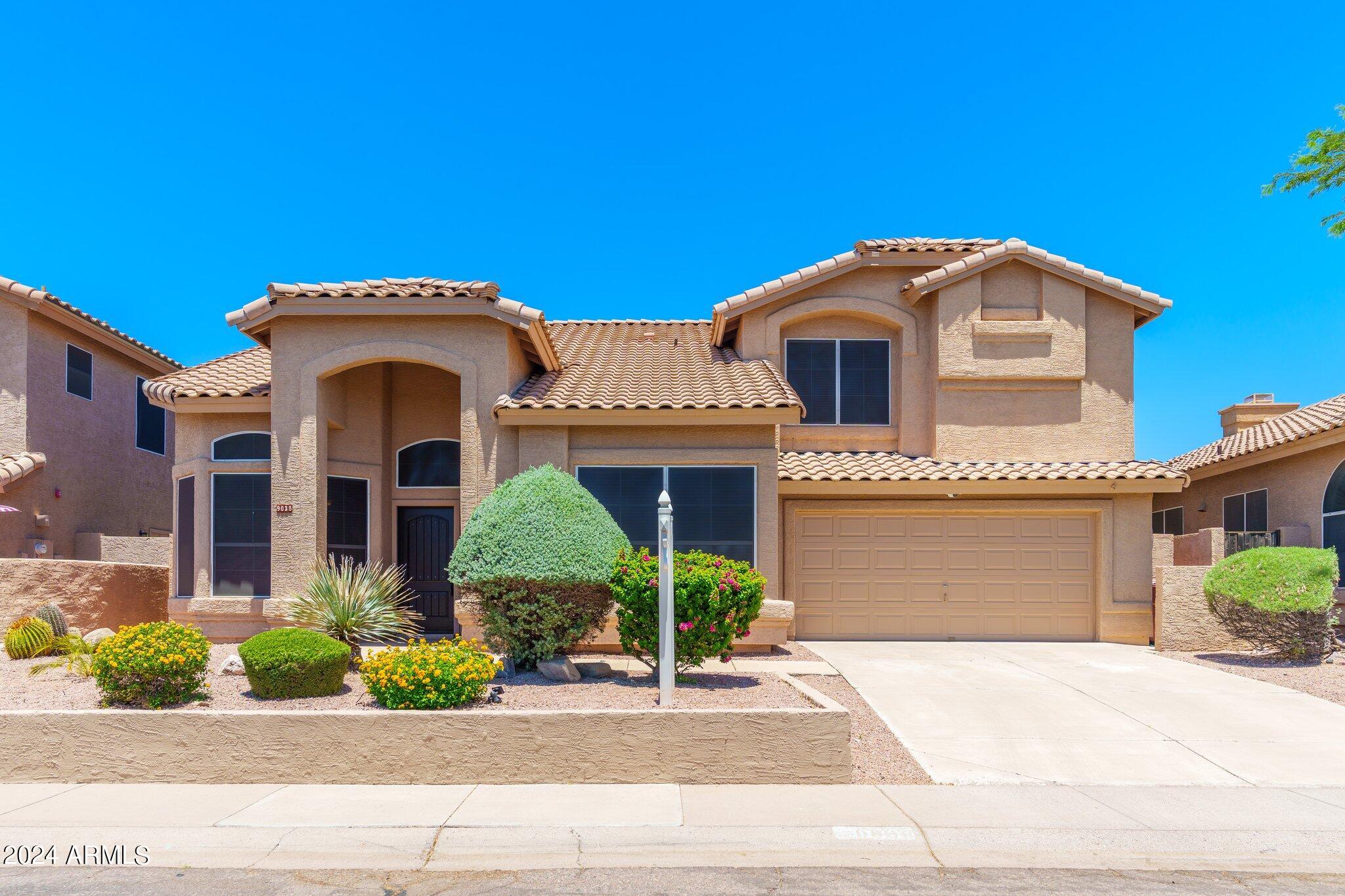 9038 E MAPLE Drive