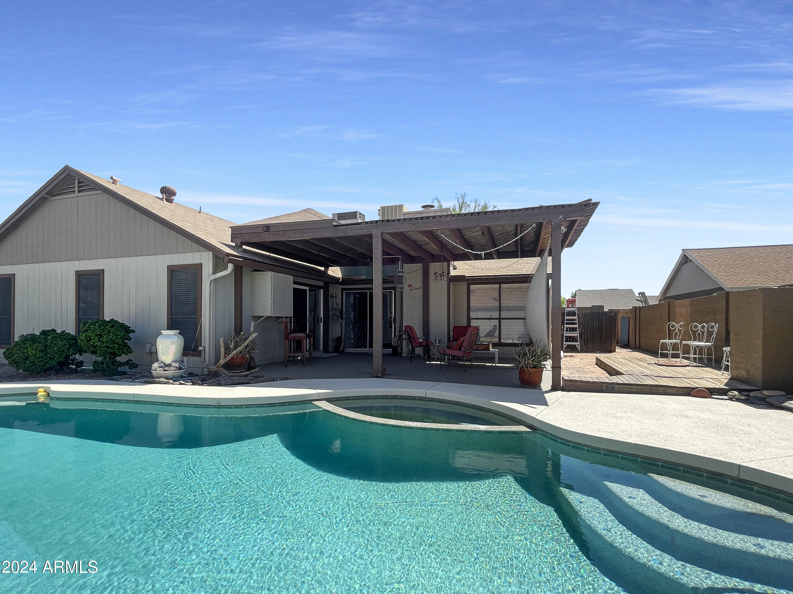 7730 W PARADISE Drive