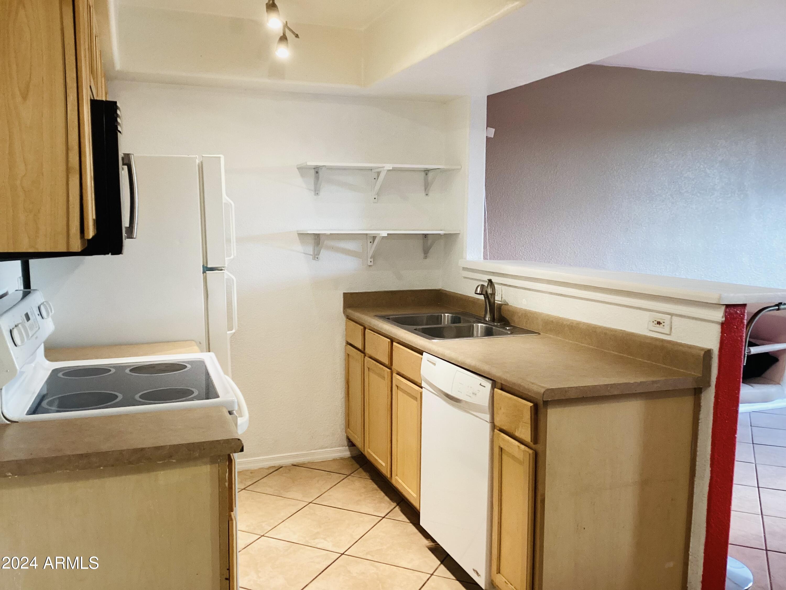 2121 W ROYAL PALM Road # 1045