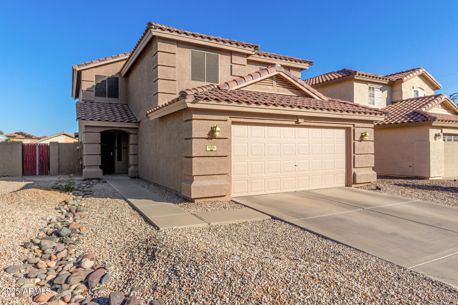 1154 E DESERT HOLLY Drive