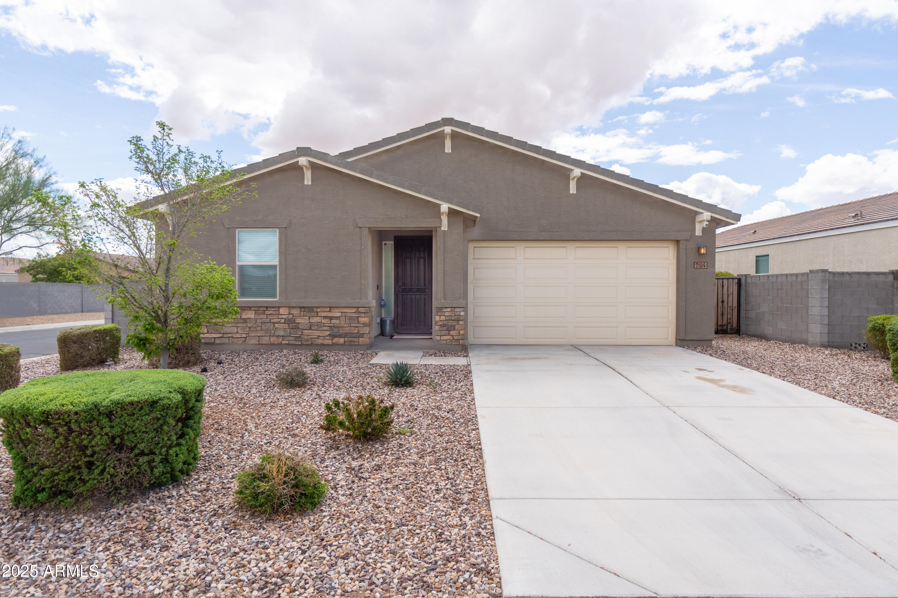 7109 E GAMEBIRD Way