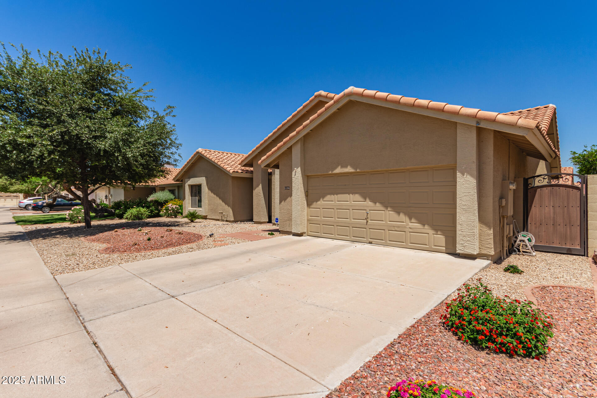 11206 W SIENO Place