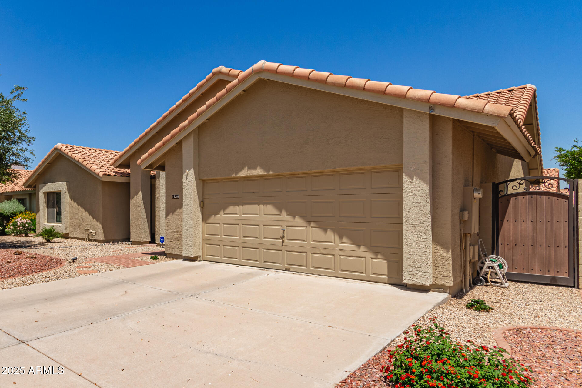 11206 W SIENO Place