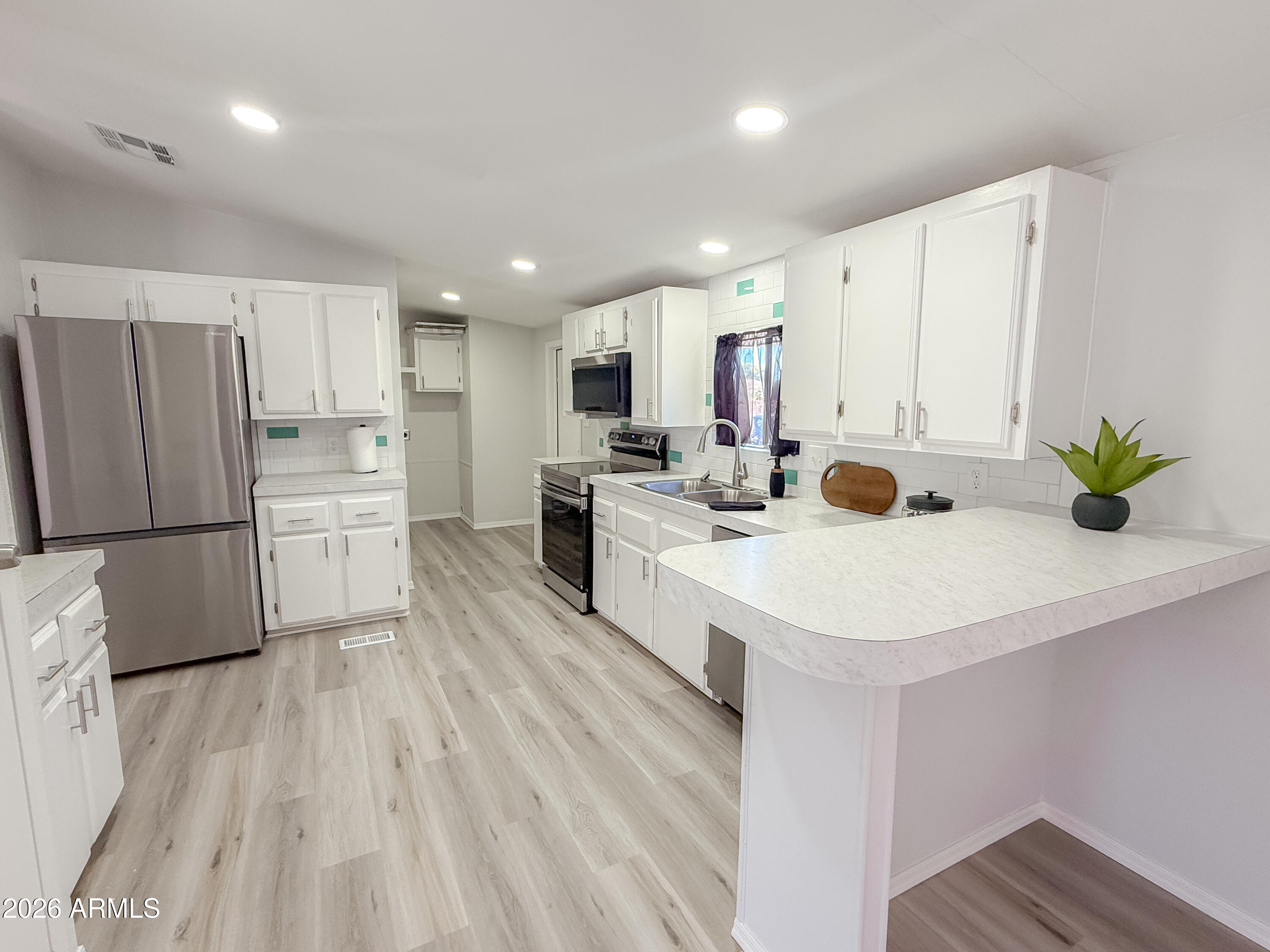 12721 W Greenway Road, 39