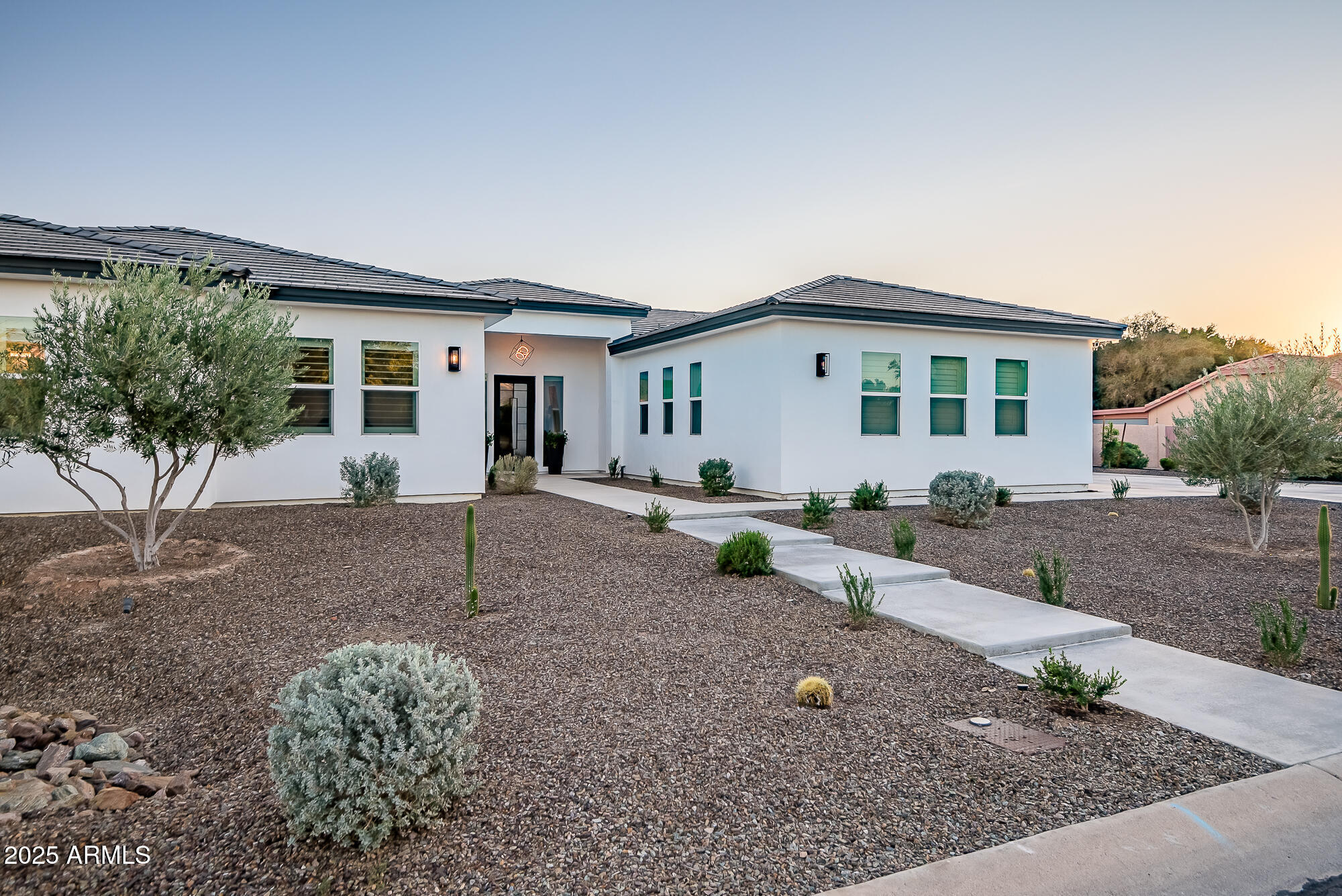 7403 W PORT AU PRINCE Lane