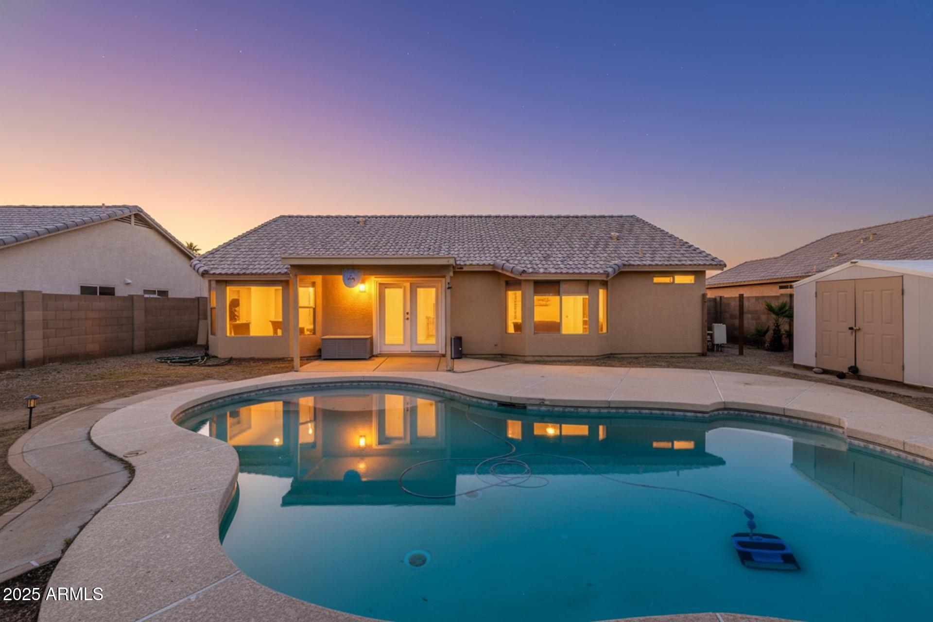 7587 W VERMONT Avenue