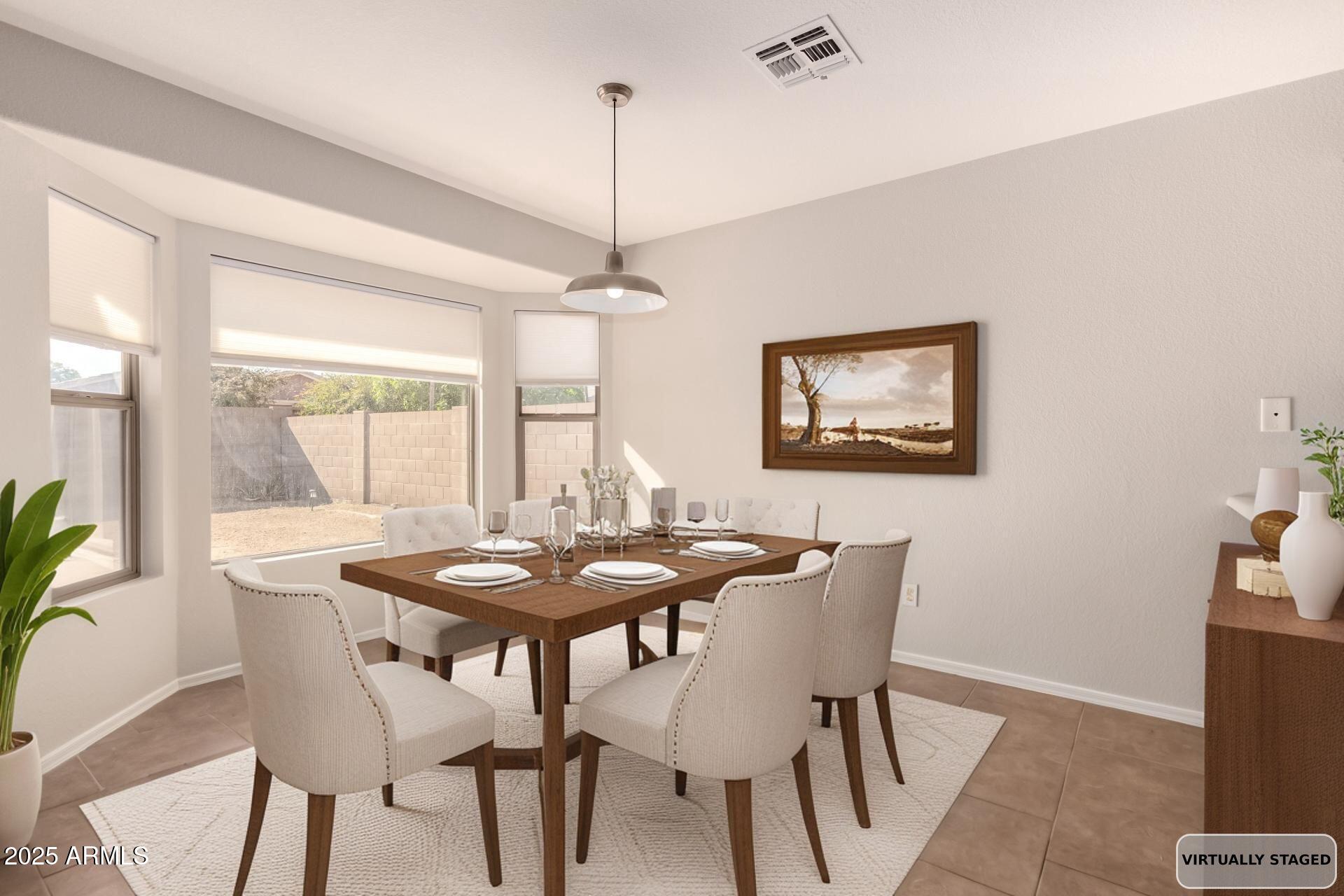 7587 W VERMONT Avenue