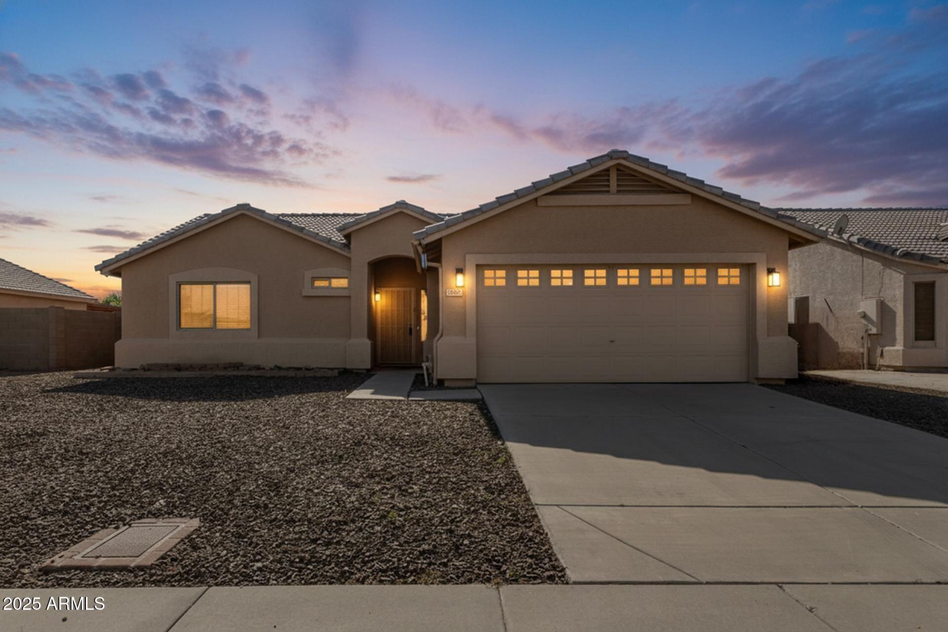 7587 W VERMONT Avenue