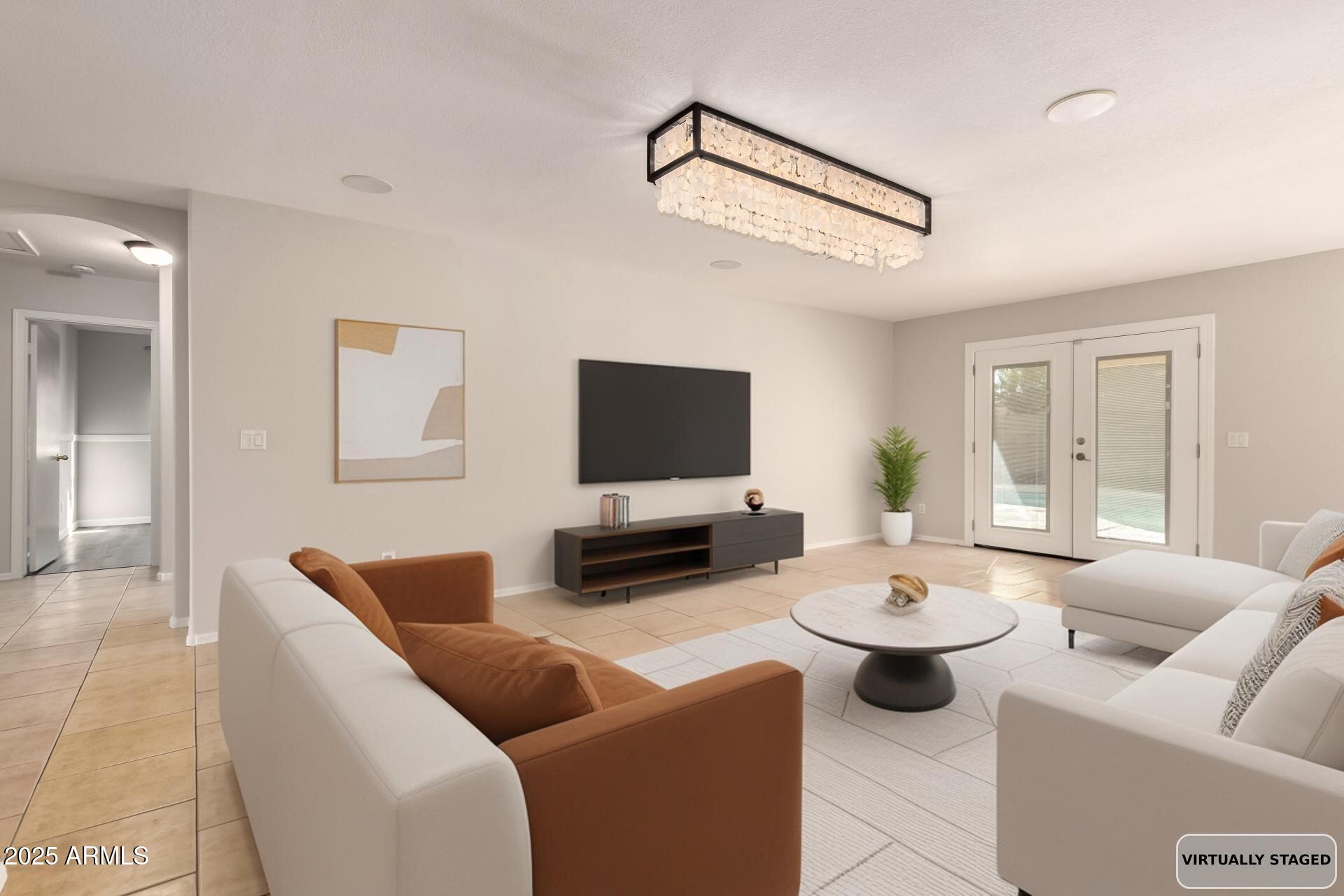 7587 W VERMONT Avenue