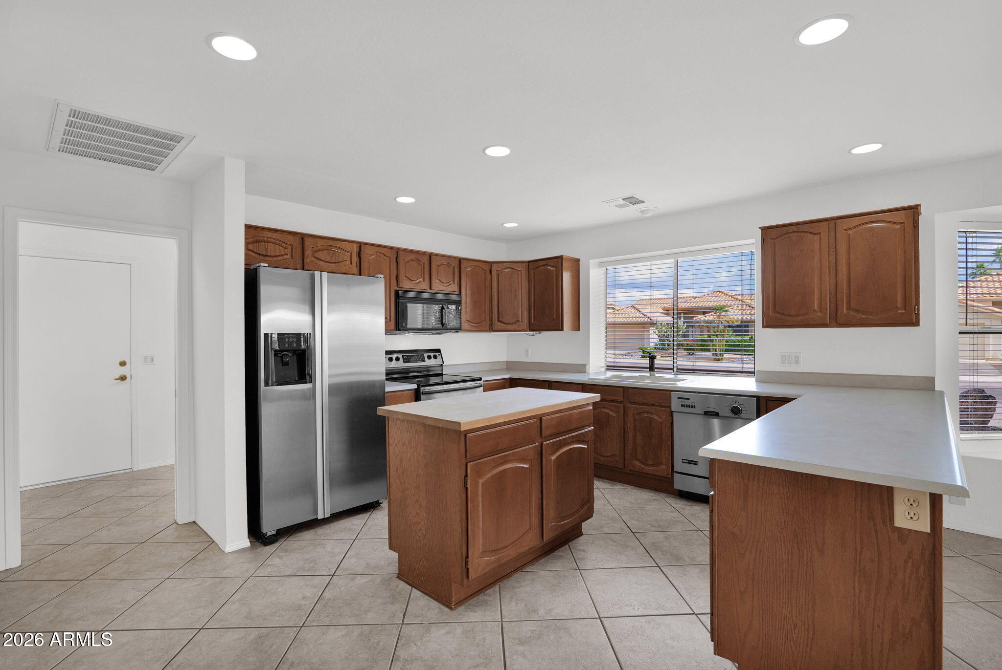 9203 W BEHREND Drive