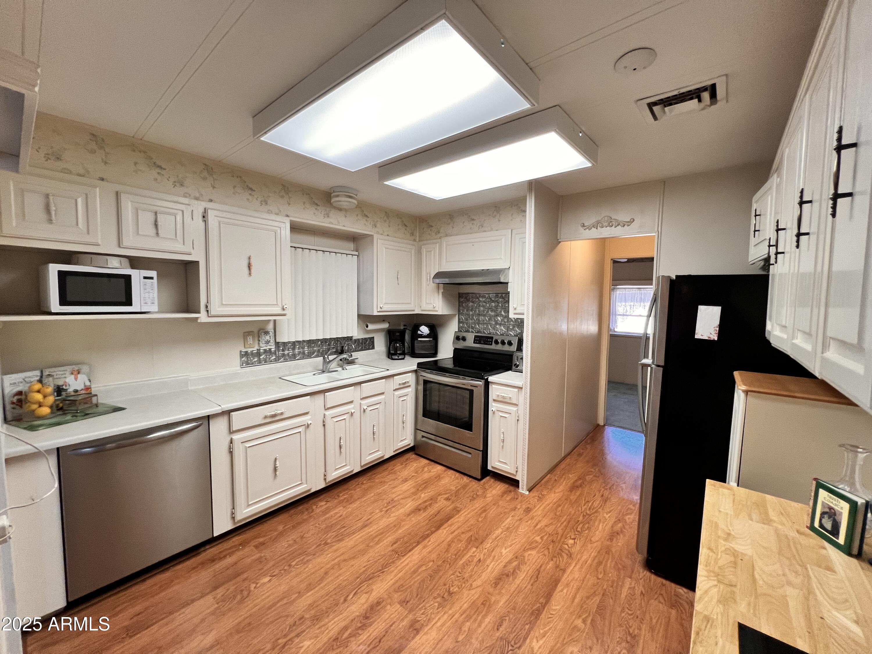 7212 E ABILENE Avenue