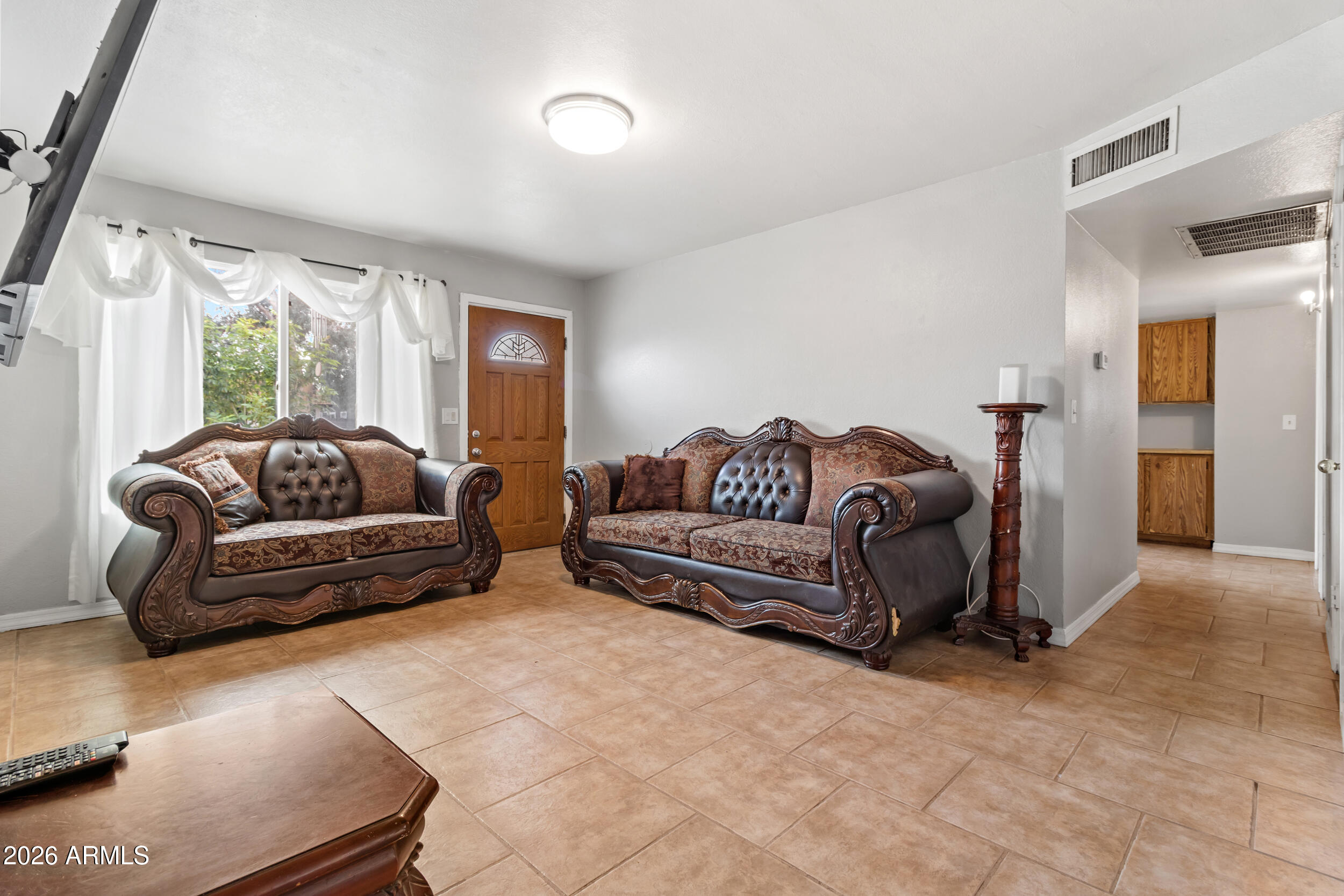 7130 W FLOWER Street