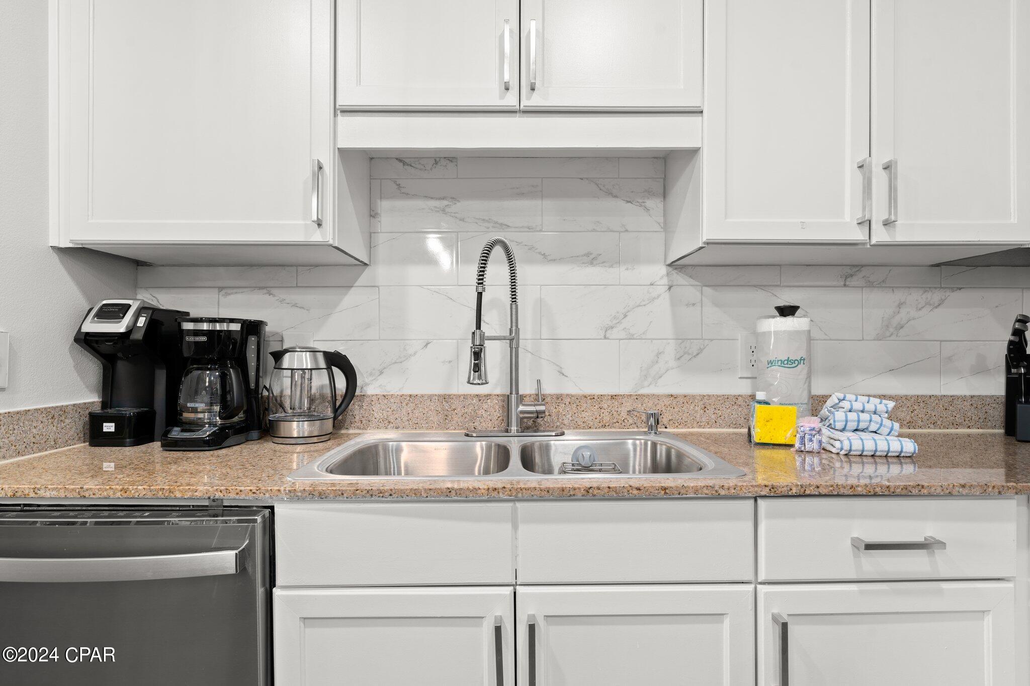 9860 S Thomas Drive 207, Beach Unit: 207