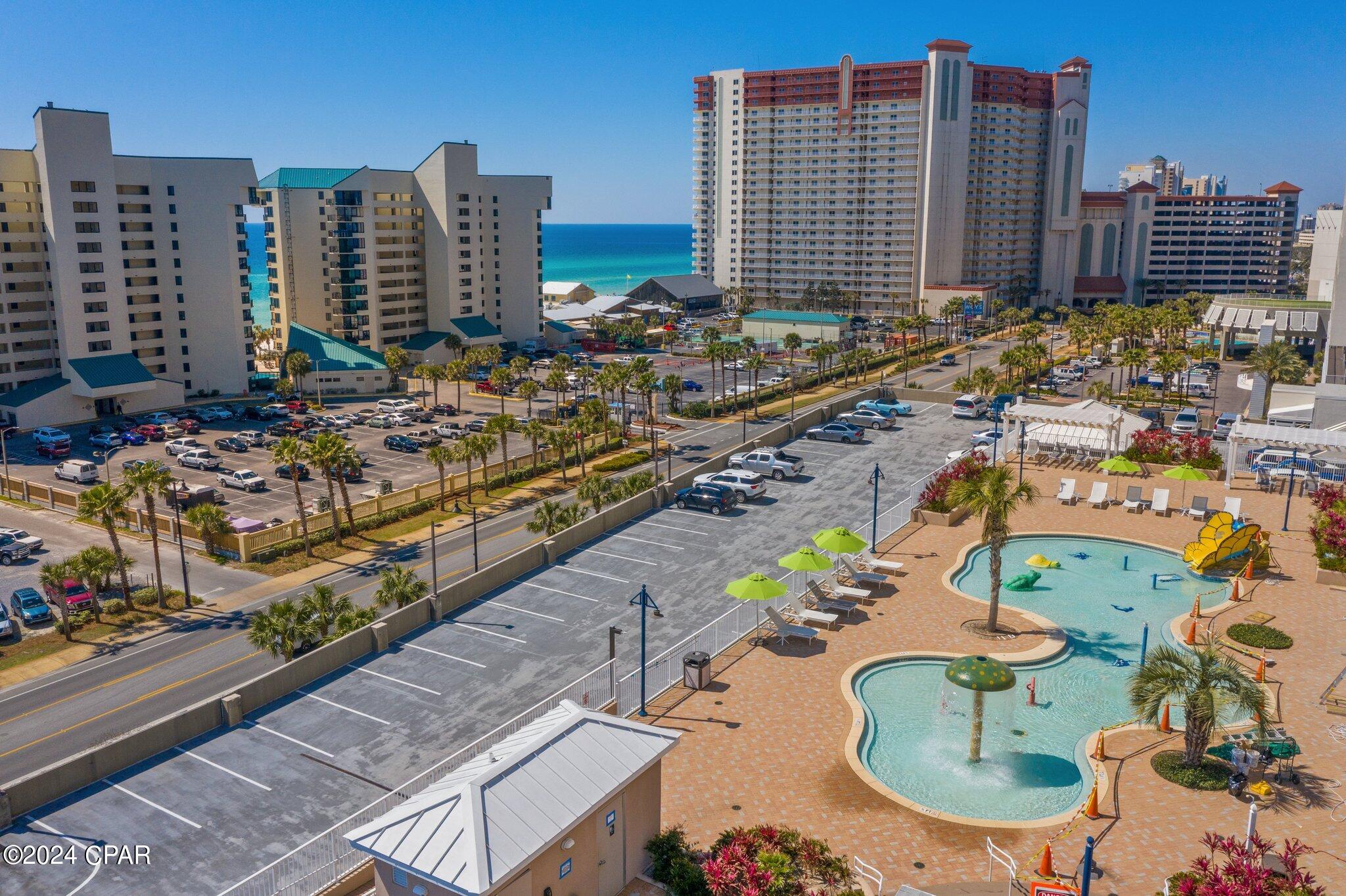 9860 S Thomas Drive 207, Beach Unit: 207