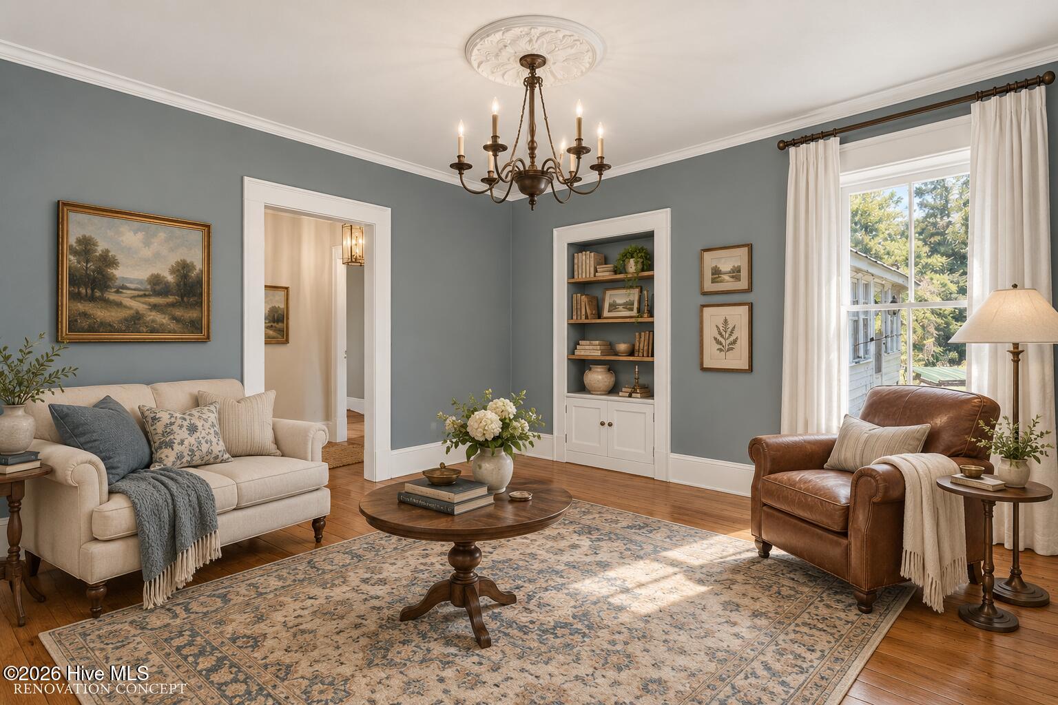 Furnished living room with slate-blue walls, cream sofa, leather armchair, and built-in shelves.