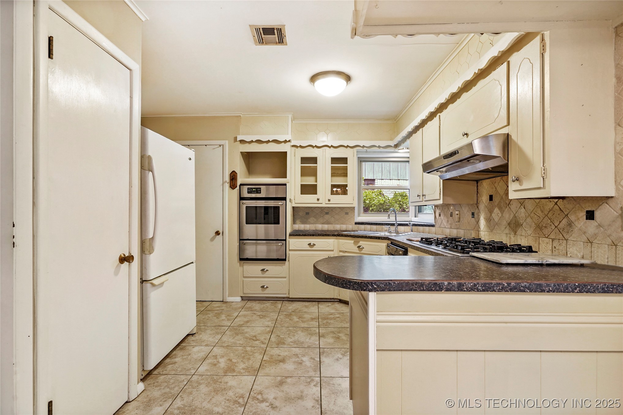 6946 E 20th Place