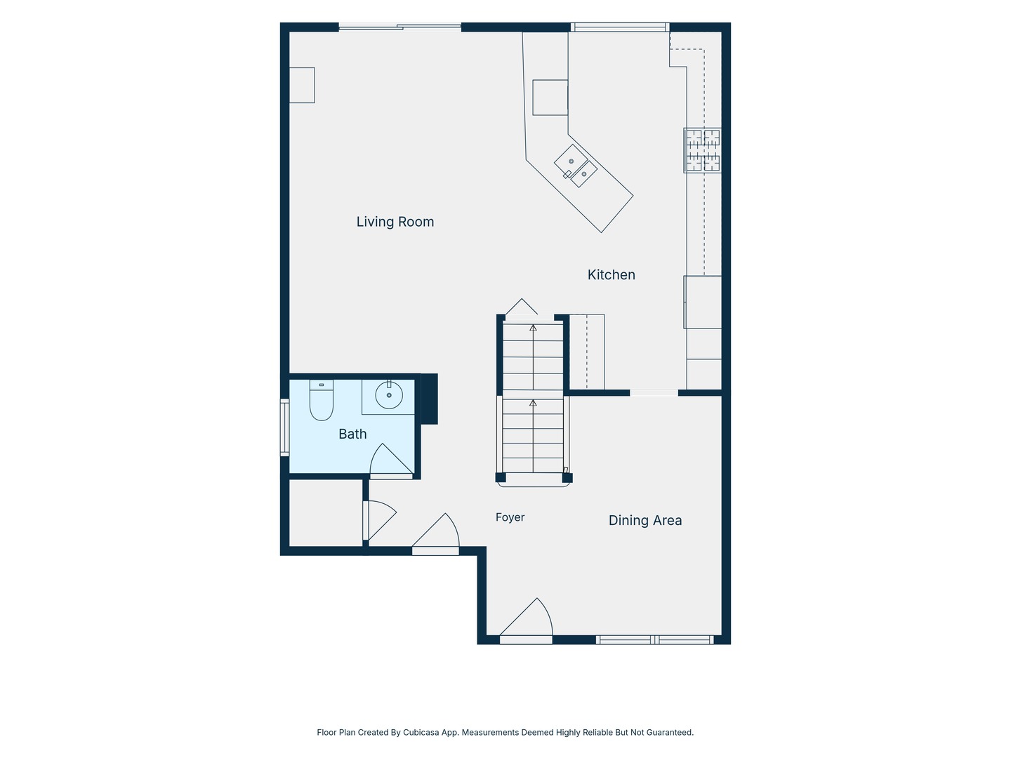 Floor plan showing the living room, kitchen, dining area, foyer, and bathroom.