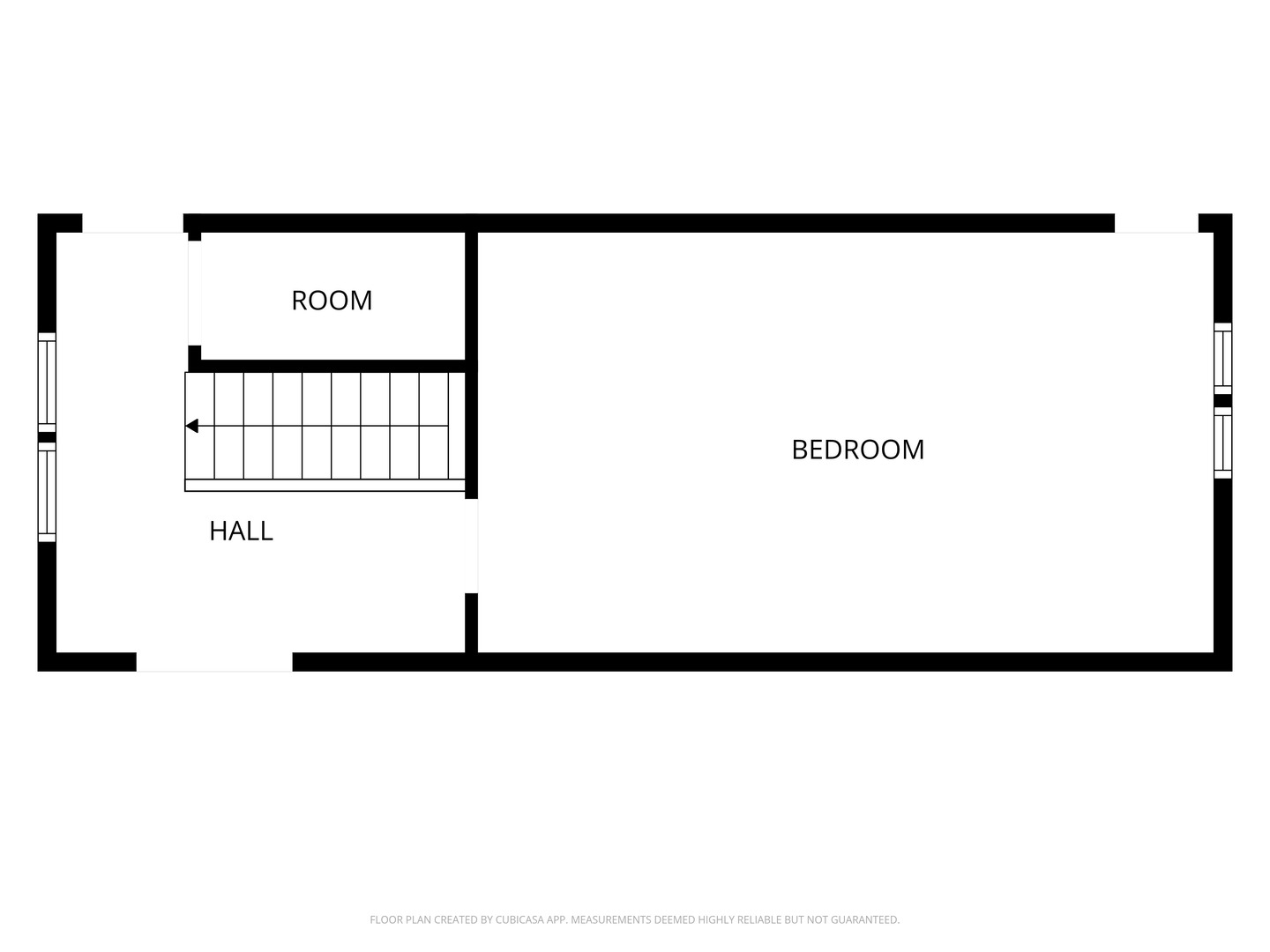 Floor plan showing a bedroom, smaller room, hall, and staircase.