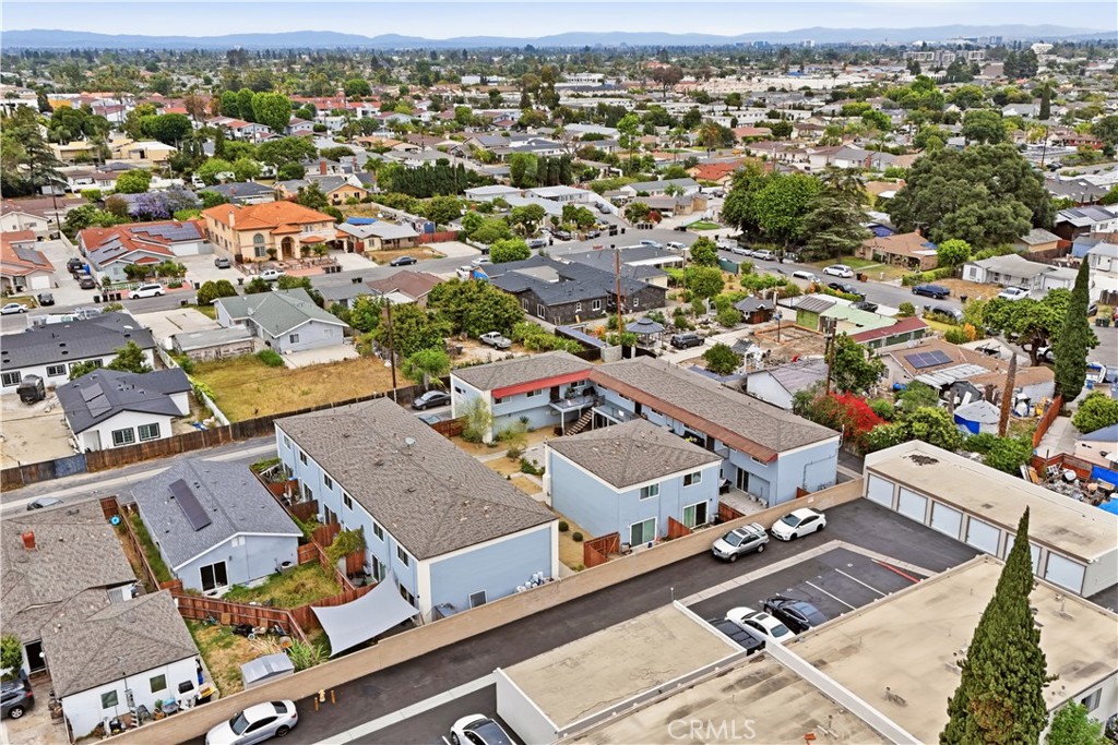 Aerial view of the Magnolia property and surrounding Garden Grove neighborhood, with distant mountains.