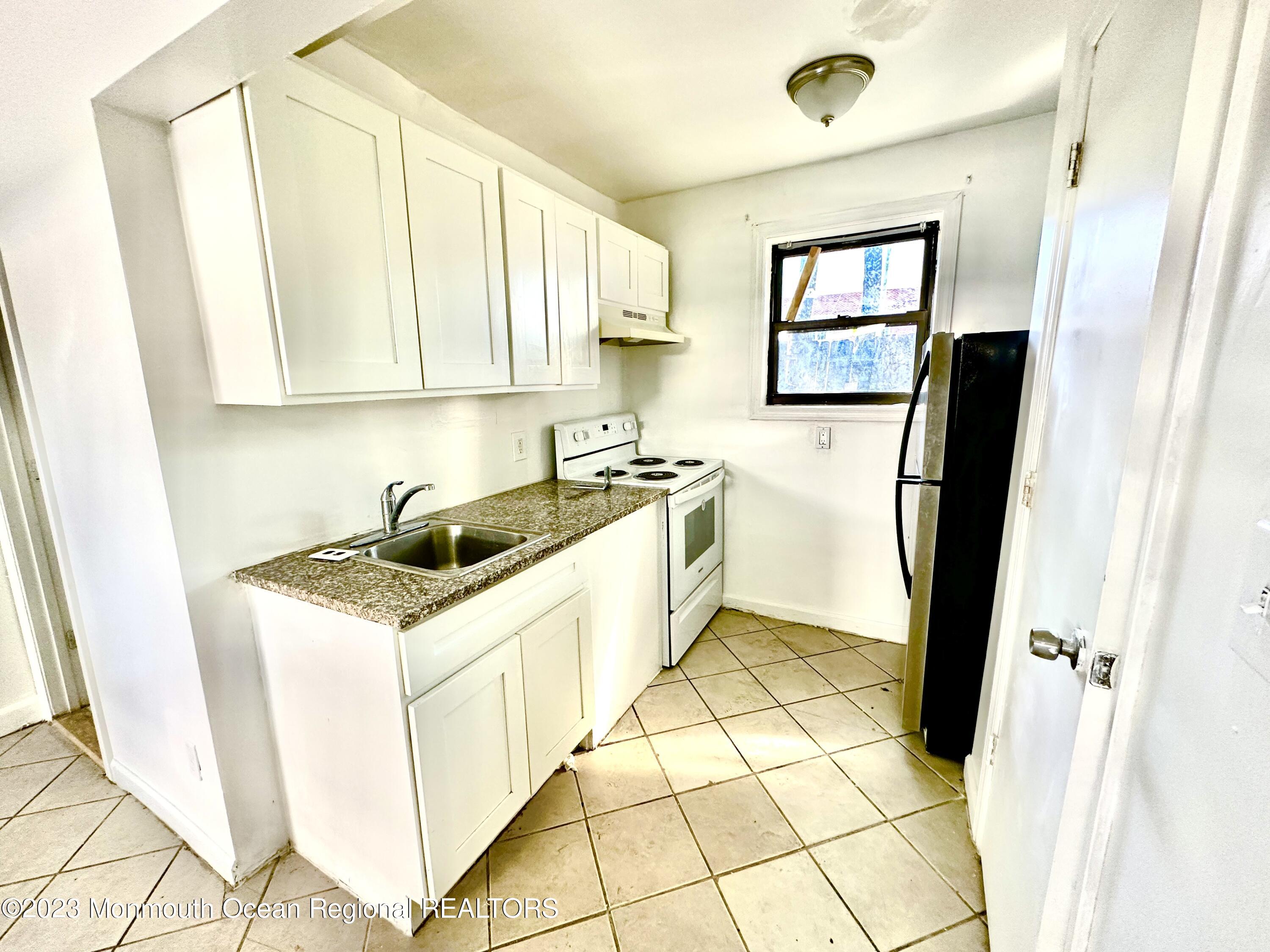 1215 Springwood Avenue, 29-32