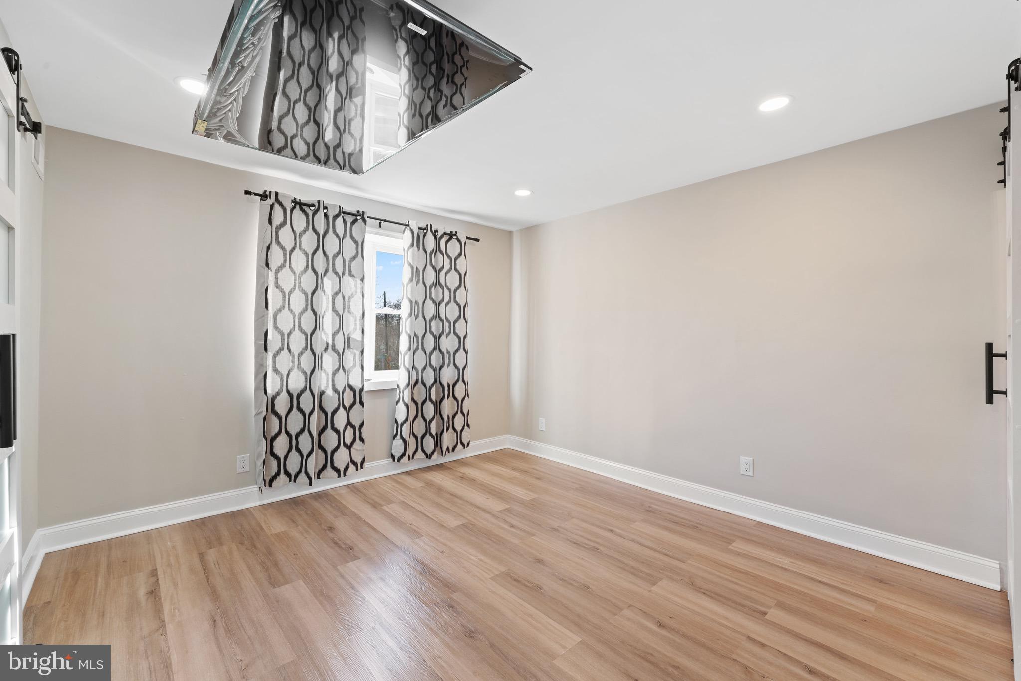 6027 WOODCREST AVENUE